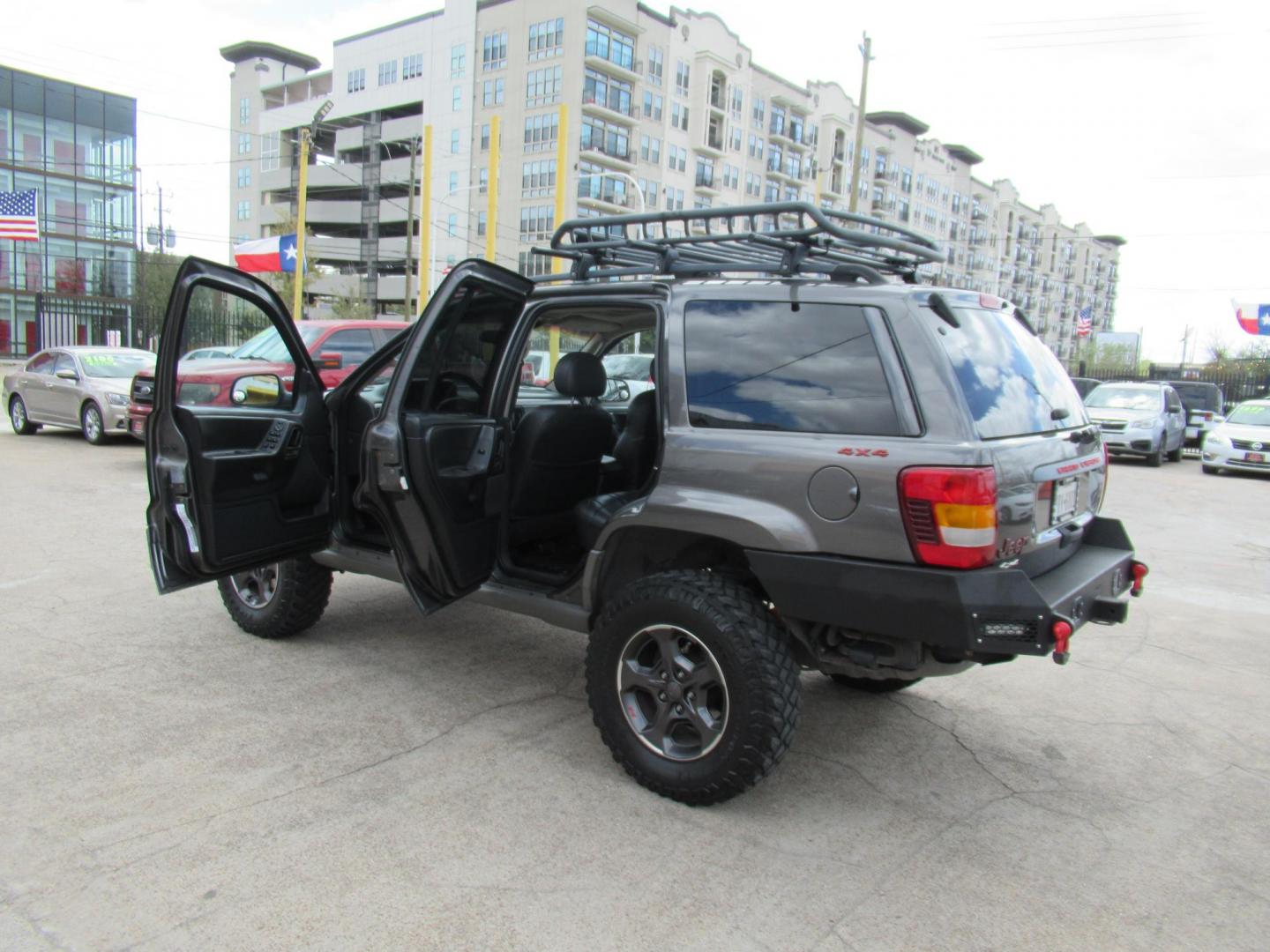 2002 Gray /Black Jeep Grand Cherokee Laredo 4WD (1J4GW48S32C) with an 4.0L L6 OHV 12V engine, 4-Speed Automatic Overdrive transmission, located at 1511 North Shepherd Dr., Houston, TX, 77008, (281) 657-1221, 29.798361, -95.412560 - 2002 JEEP GRAND CHEROKEE LAREDO VIN: 1J4GW48S32C228645 1 J 4 G W 4 8 S 3 2 C 2 2 8 6 4 5 4 DOOR WAGON/SPORT UTILITY 4.0L I6 F GASOLINE REAR WHEEL DRIVE W/ 4X4 - Photo#19