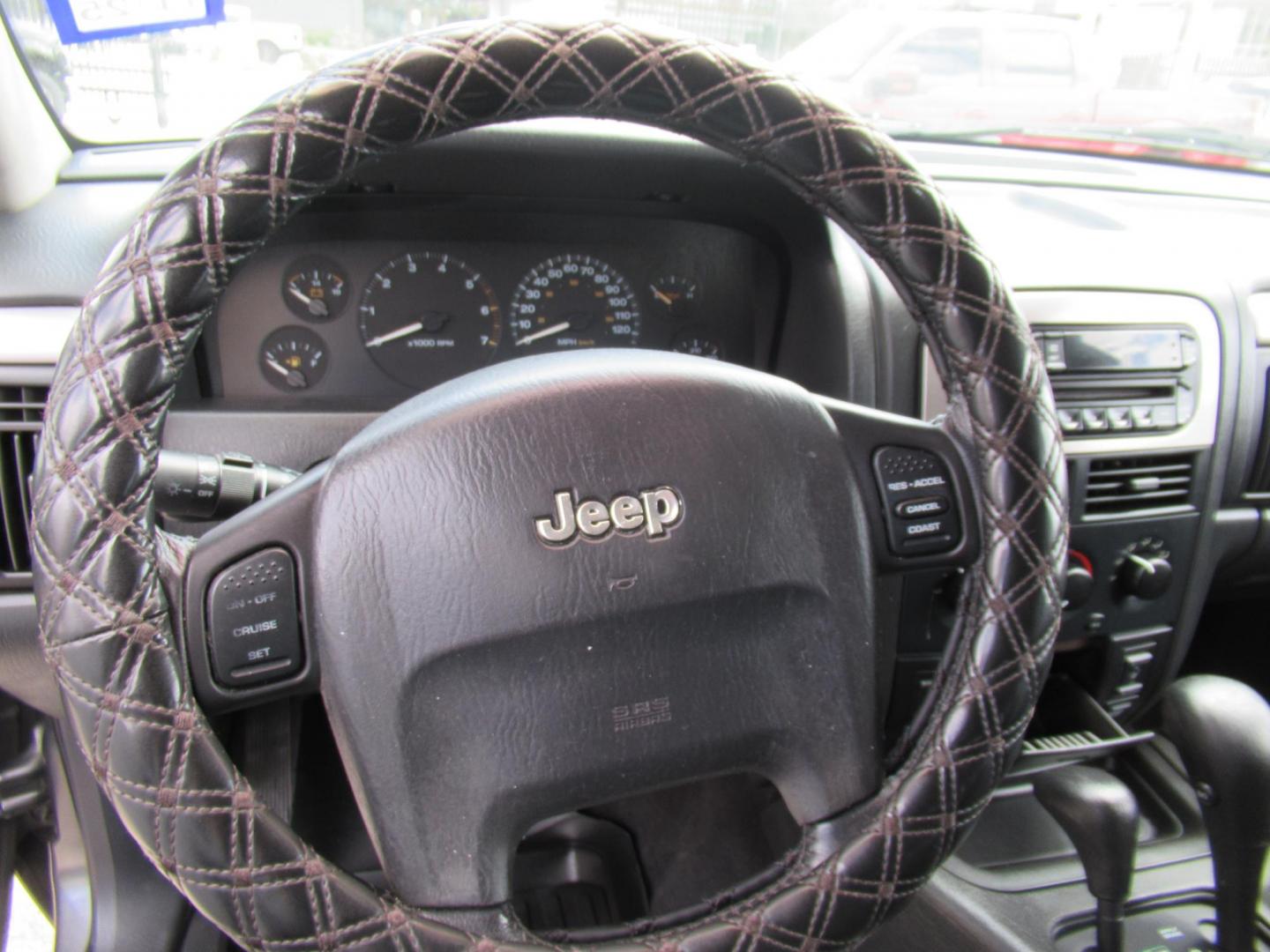 2002 Gray /Black Jeep Grand Cherokee Laredo 4WD (1J4GW48S32C) with an 4.0L L6 OHV 12V engine, 4-Speed Automatic Overdrive transmission, located at 1511 North Shepherd Dr., Houston, TX, 77008, (281) 657-1221, 29.798361, -95.412560 - 2002 JEEP GRAND CHEROKEE LAREDO VIN: 1J4GW48S32C228645 1 J 4 G W 4 8 S 3 2 C 2 2 8 6 4 5 4 DOOR WAGON/SPORT UTILITY 4.0L I6 F GASOLINE REAR WHEEL DRIVE W/ 4X4 - Photo#2