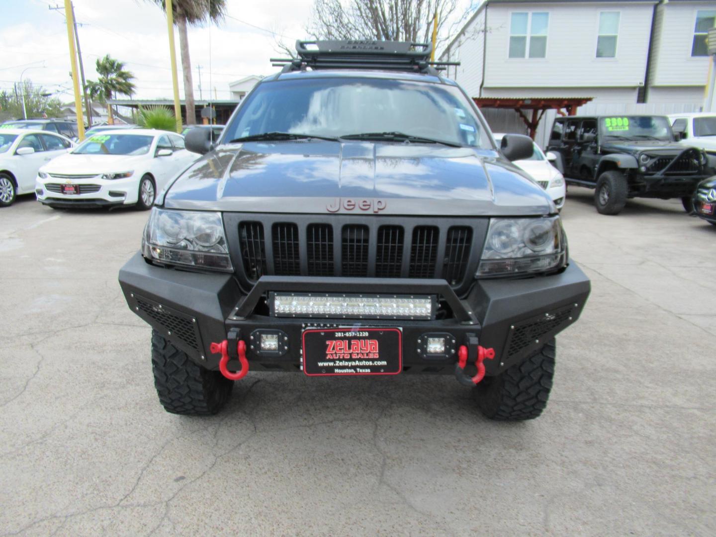 2002 Gray /Black Jeep Grand Cherokee Laredo 4WD (1J4GW48S32C) with an 4.0L L6 OHV 12V engine, 4-Speed Automatic Overdrive transmission, located at 1511 North Shepherd Dr., Houston, TX, 77008, (281) 657-1221, 29.798361, -95.412560 - 2002 JEEP GRAND CHEROKEE LAREDO VIN: 1J4GW48S32C228645 1 J 4 G W 4 8 S 3 2 C 2 2 8 6 4 5 4 DOOR WAGON/SPORT UTILITY 4.0L I6 F GASOLINE REAR WHEEL DRIVE W/ 4X4 - Photo#22