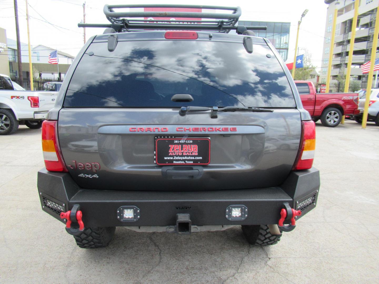 2002 Gray /Black Jeep Grand Cherokee Laredo 4WD (1J4GW48S32C) with an 4.0L L6 OHV 12V engine, 4-Speed Automatic Overdrive transmission, located at 1511 North Shepherd Dr., Houston, TX, 77008, (281) 657-1221, 29.798361, -95.412560 - 2002 JEEP GRAND CHEROKEE LAREDO VIN: 1J4GW48S32C228645 1 J 4 G W 4 8 S 3 2 C 2 2 8 6 4 5 4 DOOR WAGON/SPORT UTILITY 4.0L I6 F GASOLINE REAR WHEEL DRIVE W/ 4X4 - Photo#28