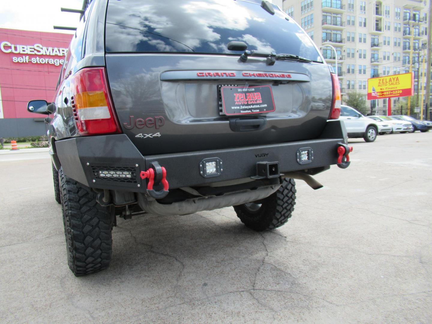 2002 Gray /Black Jeep Grand Cherokee Laredo 4WD (1J4GW48S32C) with an 4.0L L6 OHV 12V engine, 4-Speed Automatic Overdrive transmission, located at 1511 North Shepherd Dr., Houston, TX, 77008, (281) 657-1221, 29.798361, -95.412560 - 2002 JEEP GRAND CHEROKEE LAREDO VIN: 1J4GW48S32C228645 1 J 4 G W 4 8 S 3 2 C 2 2 8 6 4 5 4 DOOR WAGON/SPORT UTILITY 4.0L I6 F GASOLINE REAR WHEEL DRIVE W/ 4X4 - Photo#29