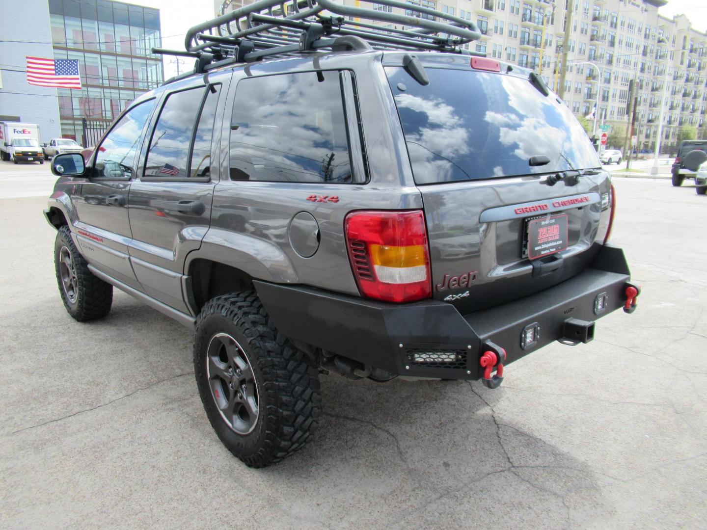 2002 Gray /Black Jeep Grand Cherokee Laredo 4WD (1J4GW48S32C) with an 4.0L L6 OHV 12V engine, 4-Speed Automatic Overdrive transmission, located at 1511 North Shepherd Dr., Houston, TX, 77008, (281) 657-1221, 29.798361, -95.412560 - 2002 JEEP GRAND CHEROKEE LAREDO VIN: 1J4GW48S32C228645 1 J 4 G W 4 8 S 3 2 C 2 2 8 6 4 5 4 DOOR WAGON/SPORT UTILITY 4.0L I6 F GASOLINE REAR WHEEL DRIVE W/ 4X4 - Photo#30