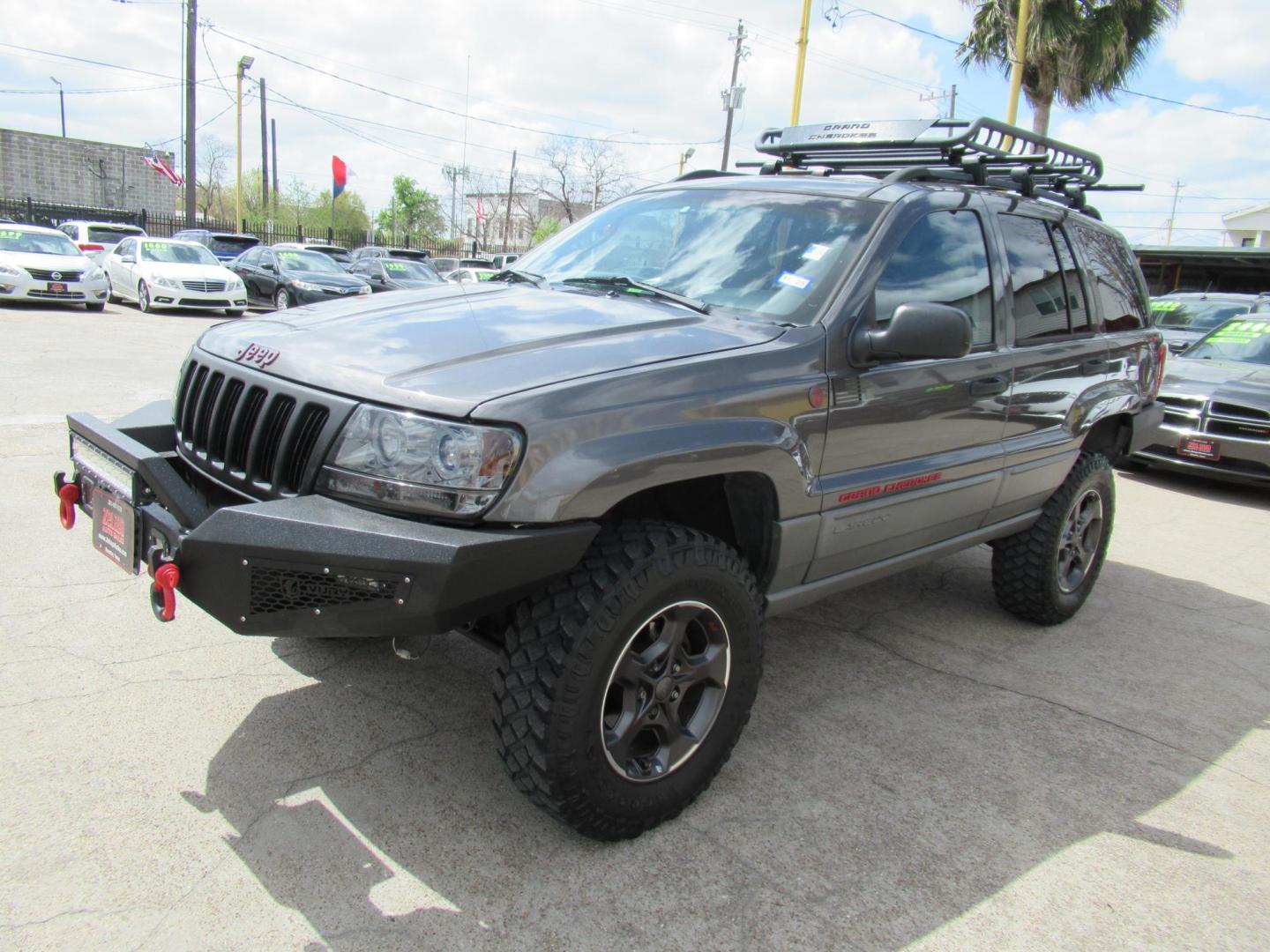 2002 Gray /Black Jeep Grand Cherokee Laredo 4WD (1J4GW48S32C) with an 4.0L L6 OHV 12V engine, 4-Speed Automatic Overdrive transmission, located at 1511 North Shepherd Dr., Houston, TX, 77008, (281) 657-1221, 29.798361, -95.412560 - 2002 JEEP GRAND CHEROKEE LAREDO VIN: 1J4GW48S32C228645 1 J 4 G W 4 8 S 3 2 C 2 2 8 6 4 5 4 DOOR WAGON/SPORT UTILITY 4.0L I6 F GASOLINE REAR WHEEL DRIVE W/ 4X4 - Photo#34