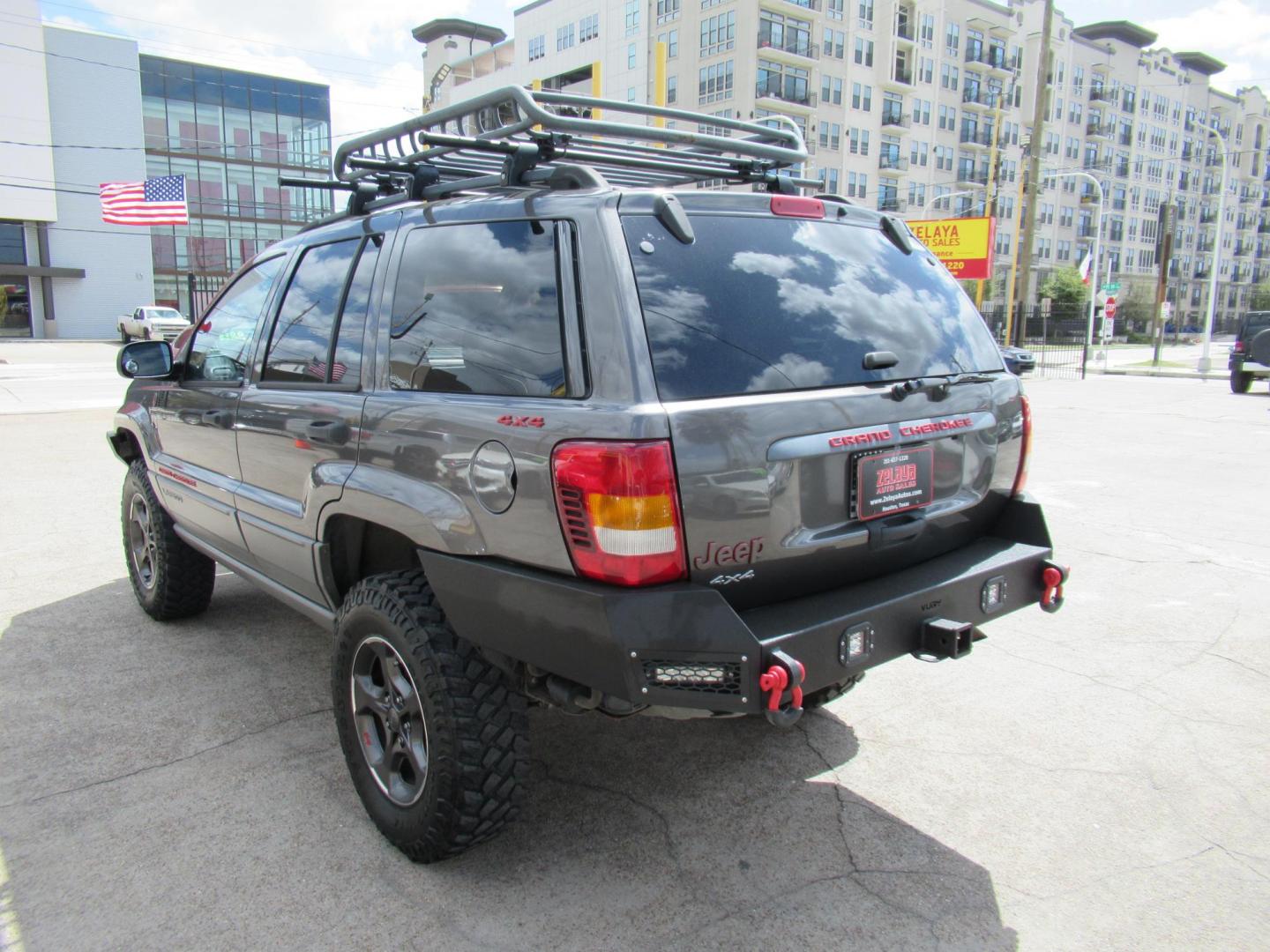 2002 Gray /Black Jeep Grand Cherokee Laredo 4WD (1J4GW48S32C) with an 4.0L L6 OHV 12V engine, 4-Speed Automatic Overdrive transmission, located at 1511 North Shepherd Dr., Houston, TX, 77008, (281) 657-1221, 29.798361, -95.412560 - 2002 JEEP GRAND CHEROKEE LAREDO VIN: 1J4GW48S32C228645 1 J 4 G W 4 8 S 3 2 C 2 2 8 6 4 5 4 DOOR WAGON/SPORT UTILITY 4.0L I6 F GASOLINE REAR WHEEL DRIVE W/ 4X4 - Photo#39