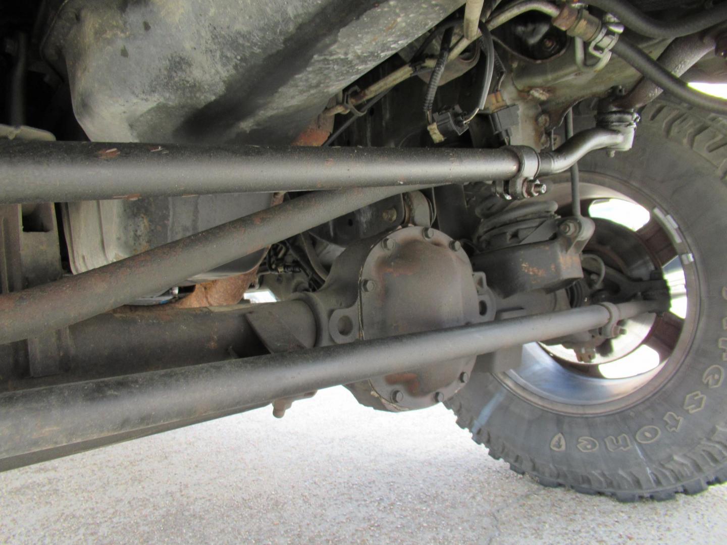 2002 Gray /Black Jeep Grand Cherokee Laredo 4WD (1J4GW48S32C) with an 4.0L L6 OHV 12V engine, 4-Speed Automatic Overdrive transmission, located at 1511 North Shepherd Dr., Houston, TX, 77008, (281) 657-1221, 29.798361, -95.412560 - 2002 JEEP GRAND CHEROKEE LAREDO VIN: 1J4GW48S32C228645 1 J 4 G W 4 8 S 3 2 C 2 2 8 6 4 5 4 DOOR WAGON/SPORT UTILITY 4.0L I6 F GASOLINE REAR WHEEL DRIVE W/ 4X4 - Photo#41
