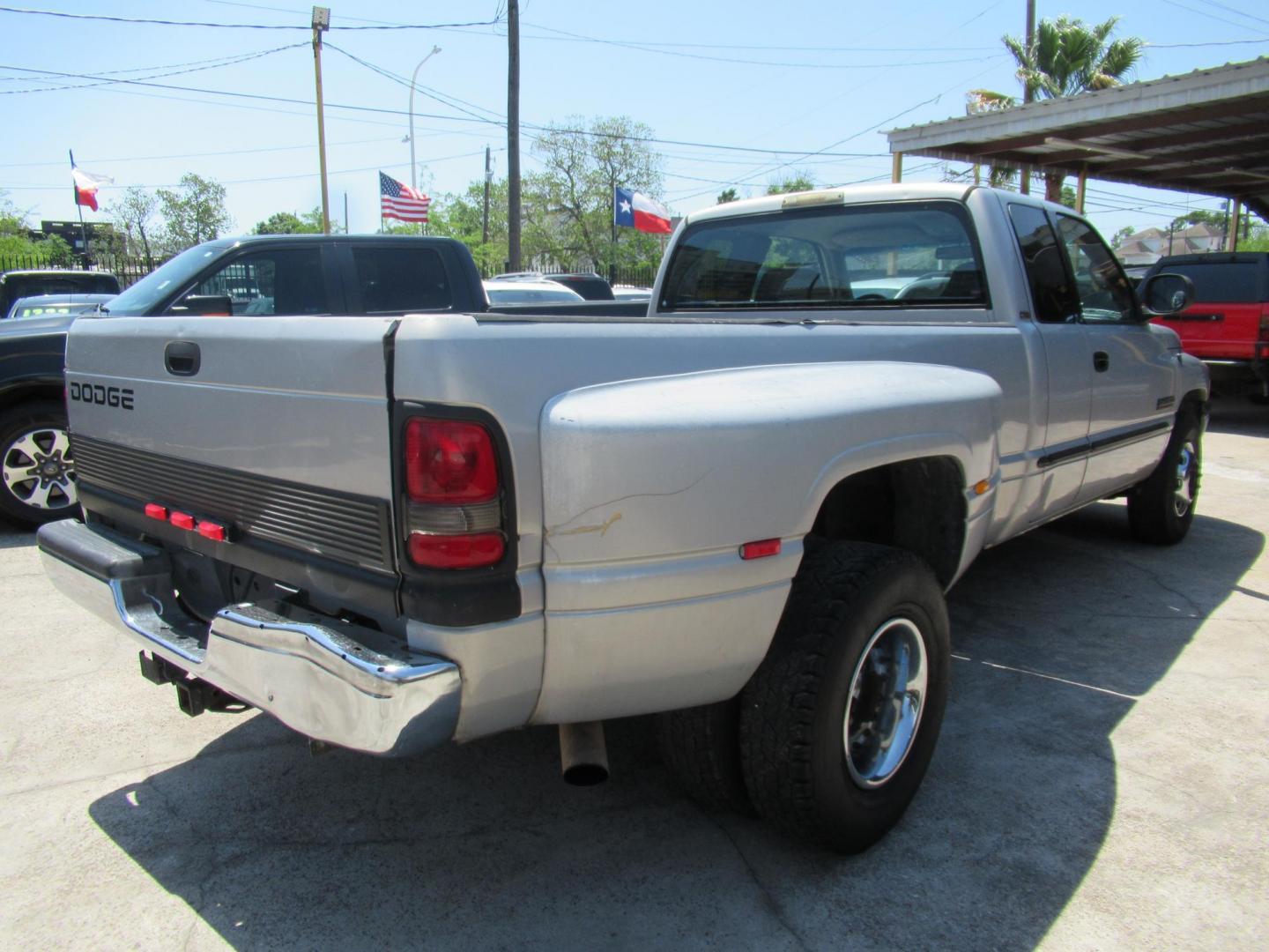 2001 Silver /Tan Dodge Ram 3500 Quad Cab Long Bed 2WD (1B7MC33641J) with an 5.9L L6 OHV 24V TURBO DIESEL engine, located at 1511 North Shepherd Dr., Houston, TX, 77008, (281) 657-1221, 29.798361, -95.412560 - 2001 DODGE RAM 3500 ST VIN: 1B7MC33641J178967 1 B 7 M C 3 3 6 4 1 J 1 7 8 9 6 7 4 DOOR EXTENDED CAB PICKUP 5.9L I6 F OHV 24V DIESEL Runs excellent, Ready for work or pleasure REAR WHEEL DRIVE - Photo#10