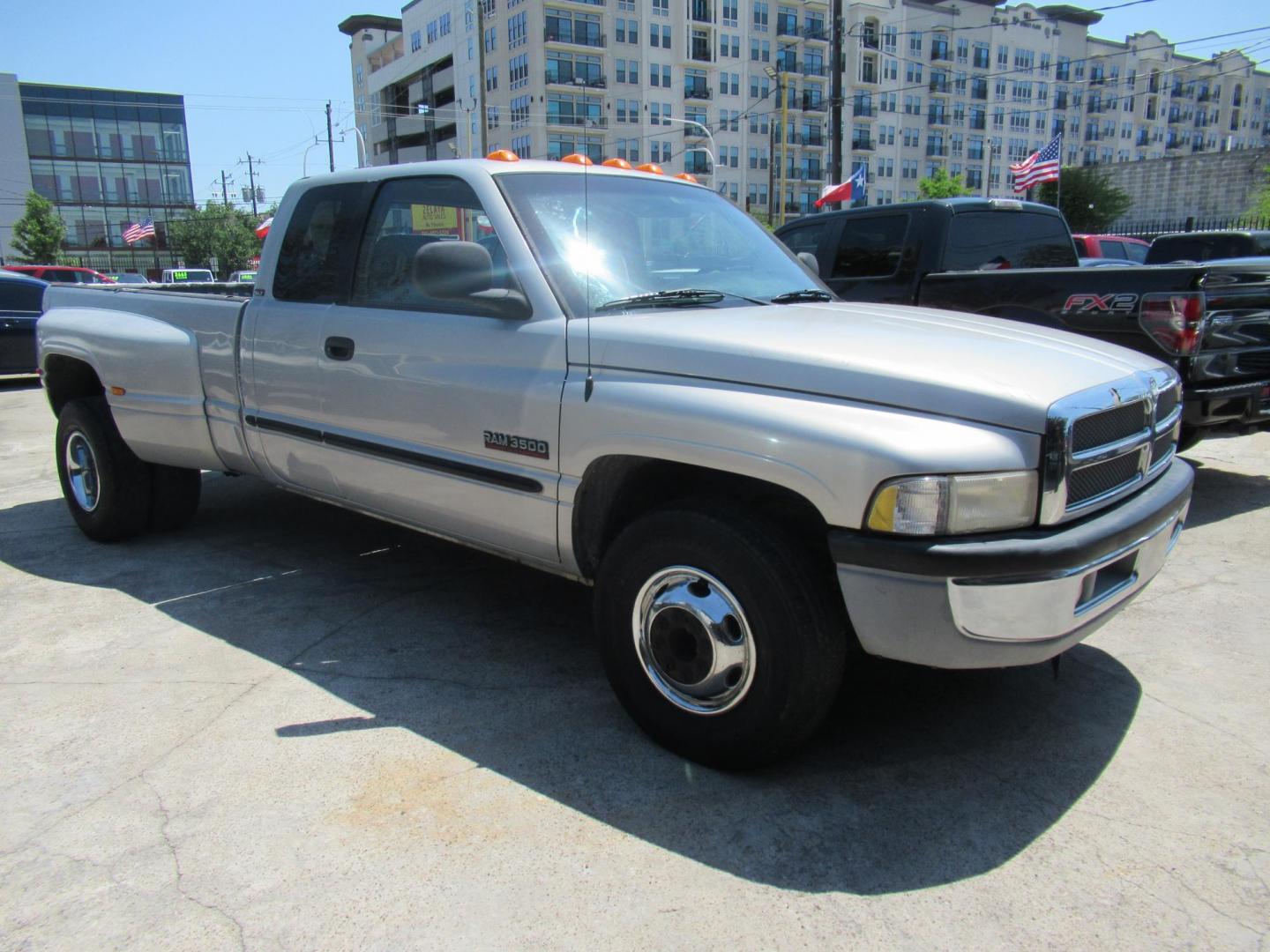 2001 Silver /Tan Dodge Ram 3500 Quad Cab Long Bed 2WD (1B7MC33641J) with an 5.9L L6 OHV 24V TURBO DIESEL engine, located at 1511 North Shepherd Dr., Houston, TX, 77008, (281) 657-1221, 29.798361, -95.412560 - 2001 DODGE RAM 3500 ST VIN: 1B7MC33641J178967 1 B 7 M C 3 3 6 4 1 J 1 7 8 9 6 7 4 DOOR EXTENDED CAB PICKUP 5.9L I6 F OHV 24V DIESEL Runs excellent, Ready for work or pleasure REAR WHEEL DRIVE - Photo#11