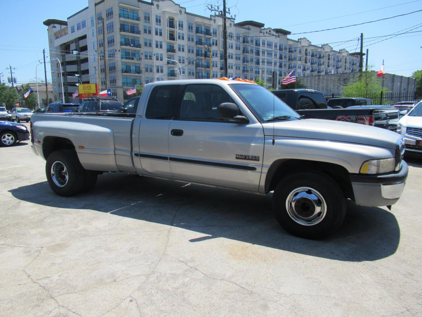 2001 Silver /Tan Dodge Ram 3500 Quad Cab Long Bed 2WD (1B7MC33641J) with an 5.9L L6 OHV 24V TURBO DIESEL engine, located at 1511 North Shepherd Dr., Houston, TX, 77008, (281) 657-1221, 29.798361, -95.412560 - 2001 DODGE RAM 3500 ST VIN: 1B7MC33641J178967 1 B 7 M C 3 3 6 4 1 J 1 7 8 9 6 7 4 DOOR EXTENDED CAB PICKUP 5.9L I6 F OHV 24V DIESEL Runs excellent, Ready for work or pleasure REAR WHEEL DRIVE - Photo#12