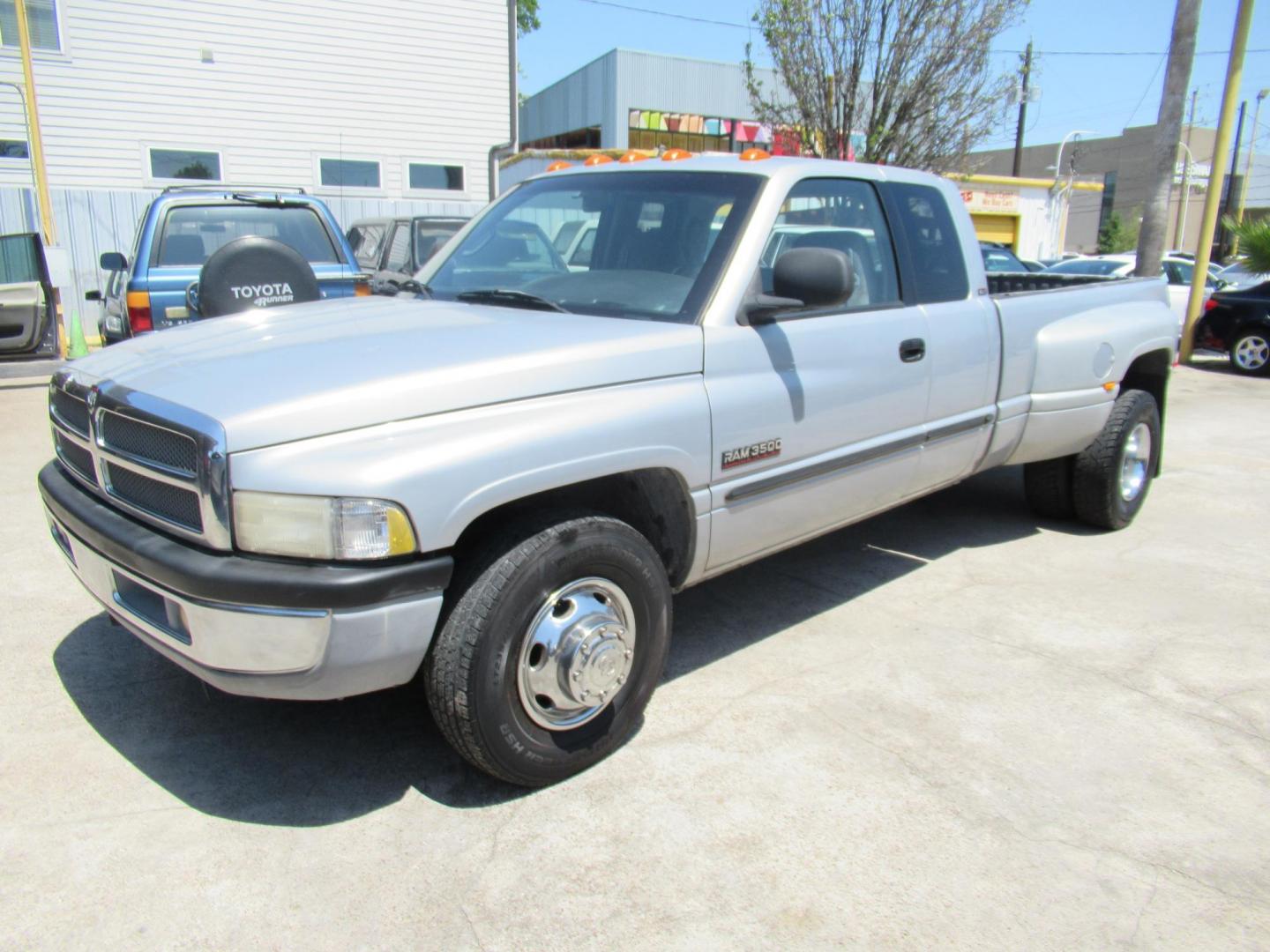 2001 Silver /Tan Dodge Ram 3500 Quad Cab Long Bed 2WD (1B7MC33641J) with an 5.9L L6 OHV 24V TURBO DIESEL engine, located at 1511 North Shepherd Dr., Houston, TX, 77008, (281) 657-1221, 29.798361, -95.412560 - 2001 DODGE RAM 3500 ST VIN: 1B7MC33641J178967 1 B 7 M C 3 3 6 4 1 J 1 7 8 9 6 7 4 DOOR EXTENDED CAB PICKUP 5.9L I6 F OHV 24V DIESEL Runs excellent, Ready for work or pleasure REAR WHEEL DRIVE - Photo#14