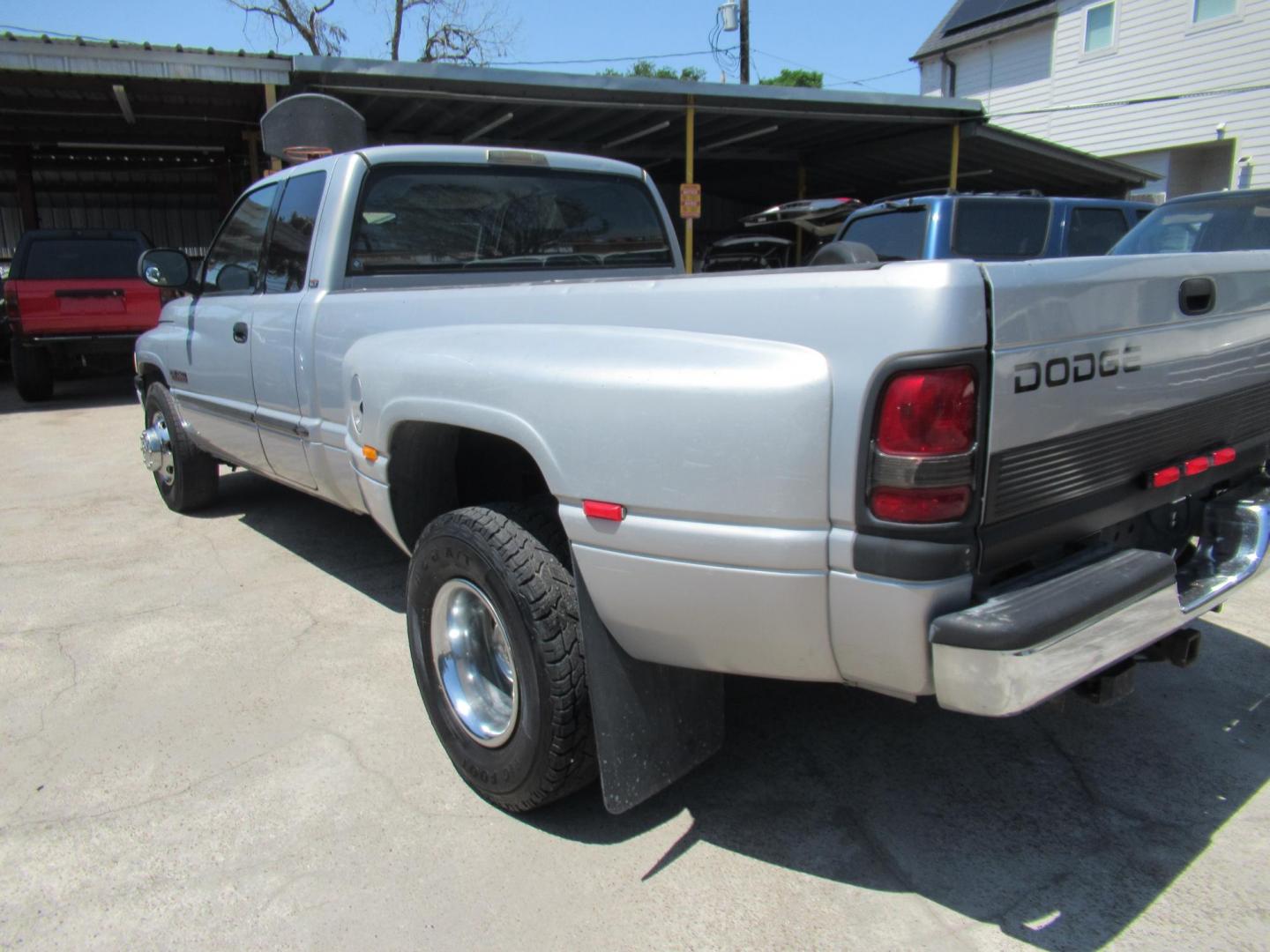 2001 Silver /Tan Dodge Ram 3500 Quad Cab Long Bed 2WD (1B7MC33641J) with an 5.9L L6 OHV 24V TURBO DIESEL engine, located at 1511 North Shepherd Dr., Houston, TX, 77008, (281) 657-1221, 29.798361, -95.412560 - 2001 DODGE RAM 3500 ST VIN: 1B7MC33641J178967 1 B 7 M C 3 3 6 4 1 J 1 7 8 9 6 7 4 DOOR EXTENDED CAB PICKUP 5.9L I6 F OHV 24V DIESEL Runs excellent, Ready for work or pleasure REAR WHEEL DRIVE - Photo#6