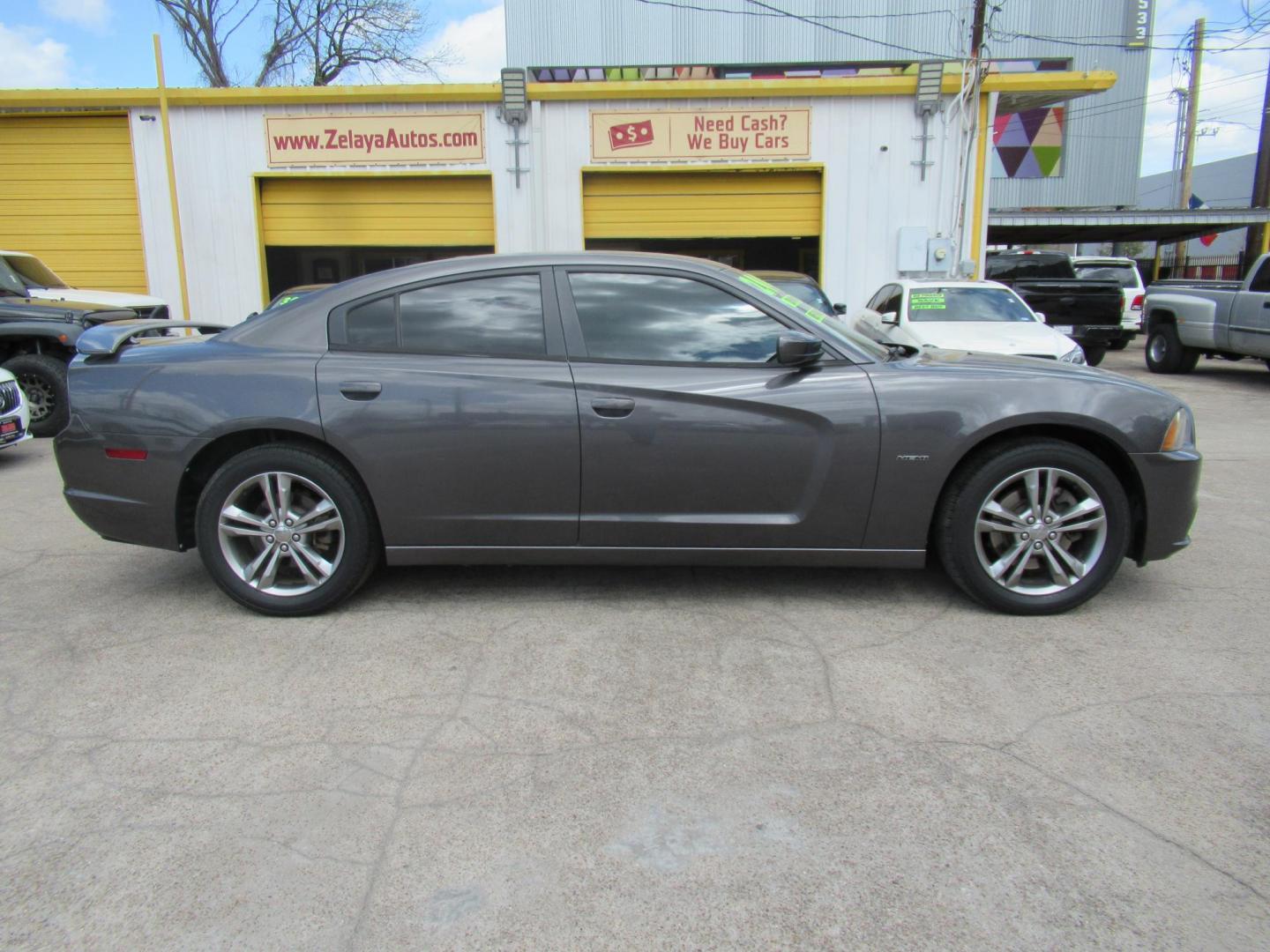 2014 Gray /Black Dodge Charger R/T AWD (2C3CDXDT2EH) with an 5.7L V8 OHV 16V engine, Automatic transmission, located at 1511 North Shepherd Dr., Houston, TX, 77008, (281) 657-1221, 29.798361, -95.412560 - 2014 DODGE CHARGER R/T VIN: 2C3CDXDT2EH167157 2 C 3 C D X D T 2 E H 1 6 7 1 5 7 SEDAN 4 DR 5.7L V8 F OHV 16V GASOLINE ALL WHEEL DRIVE - Photo#0