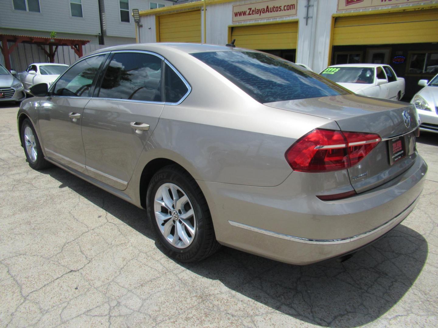 2016 Gold /Black Volkswagen Passat S 6A (1VWAS7A33GC) with an 1.8L L4 TURBO DIESEL engine, Automatic transmission, located at 1511 North Shepherd Dr., Houston, TX, 77008, (281) 657-1221, 29.798361, -95.412560 - 2016 VOLKSWAGEN PASSAT 1.8T S VIN: 1VWAS7A33GC027473 1 V W A S 7 A 3 3 G C 0 2 7 4 7 3 SEDAN 4 DR 1.8L I4 F DOHC 16V GASOLINE FRONT WHEEL DRIVE - Photo#17