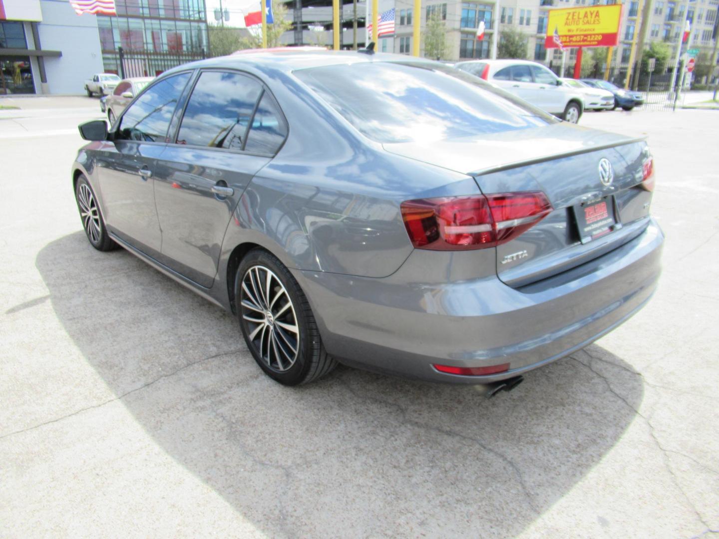 2016 Gray /Tan Volkswagen Jetta SE 6A (3VWD17AJ8GM) with an 1.8L L4 DOHC 20V engine, Automatic transmission, located at 1511 North Shepherd Dr., Houston, TX, 77008, (281) 657-1221, 29.798361, -95.412560 - 2016 VOLKSWAGEN JETTA 1.8T SPORT VIN: 3VWD17AJ8GM397444 3 V W D 1 7 A J 8 G M 3 9 7 4 4 4 SEDAN 4 DR 1.8L I4 F DOHC 16V GASOLINE FRONT WHEEL DRIVE - Photo#16