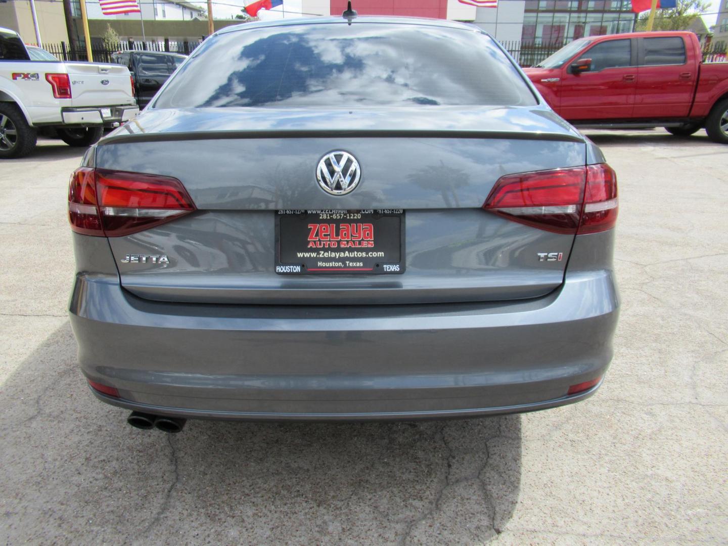 2016 Gray /Tan Volkswagen Jetta SE 6A (3VWD17AJ8GM) with an 1.8L L4 DOHC 20V engine, Automatic transmission, located at 1511 North Shepherd Dr., Houston, TX, 77008, (281) 657-1221, 29.798361, -95.412560 - 2016 VOLKSWAGEN JETTA 1.8T SPORT VIN: 3VWD17AJ8GM397444 3 V W D 1 7 A J 8 G M 3 9 7 4 4 4 SEDAN 4 DR 1.8L I4 F DOHC 16V GASOLINE FRONT WHEEL DRIVE - Photo#18
