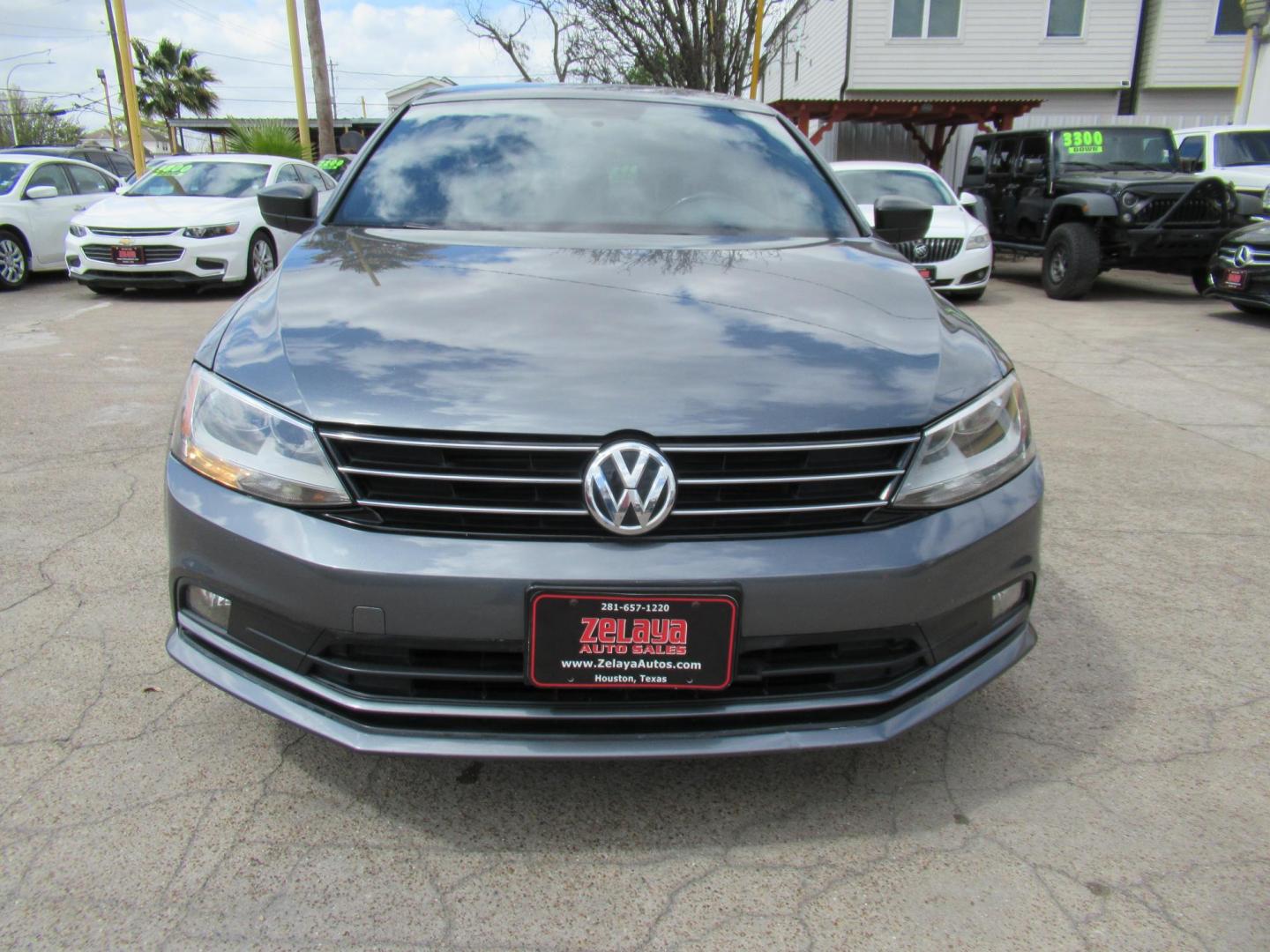 2016 Gray /Tan Volkswagen Jetta SE 6A (3VWD17AJ8GM) with an 1.8L L4 DOHC 20V engine, Automatic transmission, located at 1511 North Shepherd Dr., Houston, TX, 77008, (281) 657-1221, 29.798361, -95.412560 - 2016 VOLKSWAGEN JETTA 1.8T SPORT VIN: 3VWD17AJ8GM397444 3 V W D 1 7 A J 8 G M 3 9 7 4 4 4 SEDAN 4 DR 1.8L I4 F DOHC 16V GASOLINE FRONT WHEEL DRIVE - Photo#22