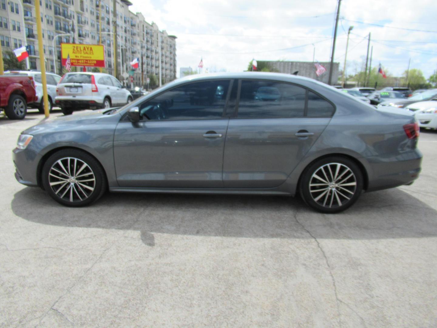 2016 Gray /Tan Volkswagen Jetta SE 6A (3VWD17AJ8GM) with an 1.8L L4 DOHC 20V engine, Automatic transmission, located at 1511 North Shepherd Dr., Houston, TX, 77008, (281) 657-1221, 29.798361, -95.412560 - 2016 VOLKSWAGEN JETTA 1.8T SPORT VIN: 3VWD17AJ8GM397444 3 V W D 1 7 A J 8 G M 3 9 7 4 4 4 SEDAN 4 DR 1.8L I4 F DOHC 16V GASOLINE FRONT WHEEL DRIVE - Photo#24