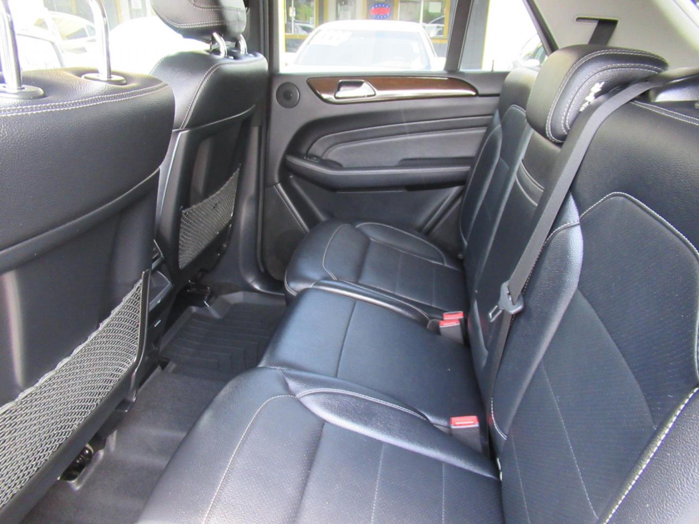 2014 Black /Black Mercedes-Benz M-Class ML350 4MATIC (4JGDA5HB4EA) with an 3.5L V6 DOHC 24V engine, 7-Speed Automatic transmission, located at 1511 North Shepherd Dr., Houston, TX, 77008, (281) 657-1221, 29.798361, -95.412560 - 2014 MERCEDES-BENZ M-CLASS ML 350 4MATIC VIN: 4JGDA5HB4EA354649 4 J G D A 5 H B 4 E A 3 5 4 6 4 9 4 DOOR WAGON/SPORT UTILITY 3.5L V6 F DOHC 24V GASOLINE ALL WHEEL DRIVE - Photo#10