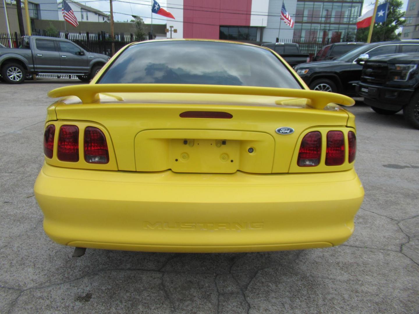 1998 Yellow /Gray Ford Mustang Coupe (1FAFP4044WF) with an 3.8L V6 OHV 12V engine, Manual transmission, located at 1511 North Shepherd Dr., Houston, TX, 77008, (281) 657-1221, 29.798361, -95.412560 - 1998 FORD MUSTANG VIN: 1FAFP4044WF252202 1 F A F P 4 0 4 4 W F 2 5 2 2 0 2 COUPE 3.8L V6 F GASOLINE REAR WHEEL DRIVE - Photo#18