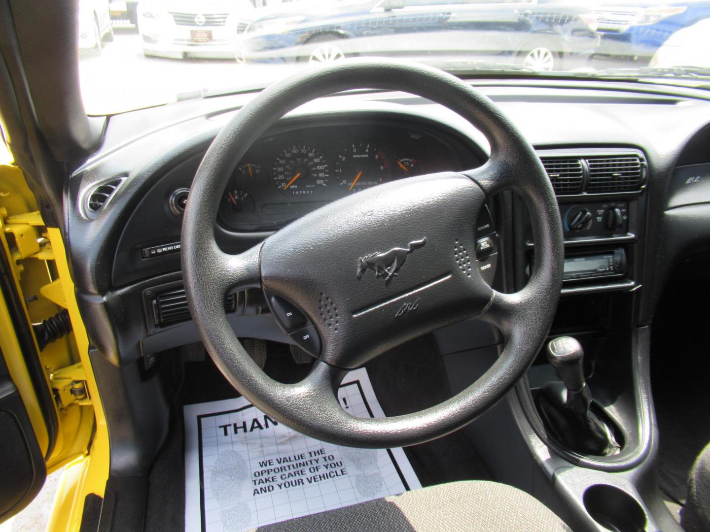 1998 Yellow /Gray Ford Mustang Coupe (1FAFP4044WF) with an 3.8L V6 OHV 12V engine, Manual transmission, located at 1511 North Shepherd Dr., Houston, TX, 77008, (281) 657-1221, 29.798361, -95.412560 - 1998 FORD MUSTANG VIN: 1FAFP4044WF252202 1 F A F P 4 0 4 4 W F 2 5 2 2 0 2 COUPE 3.8L V6 F GASOLINE REAR WHEEL DRIVE - Photo#4
