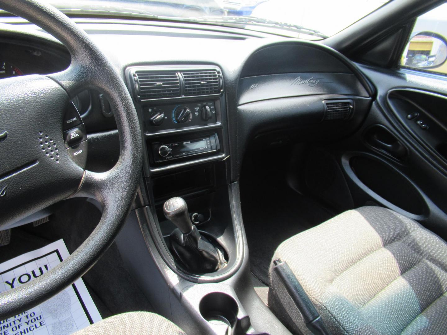 1998 Yellow /Gray Ford Mustang Coupe (1FAFP4044WF) with an 3.8L V6 OHV 12V engine, Manual transmission, located at 1511 North Shepherd Dr., Houston, TX, 77008, (281) 657-1221, 29.798361, -95.412560 - 1998 FORD MUSTANG VIN: 1FAFP4044WF252202 1 F A F P 4 0 4 4 W F 2 5 2 2 0 2 COUPE 3.8L V6 F GASOLINE REAR WHEEL DRIVE - Photo#5
