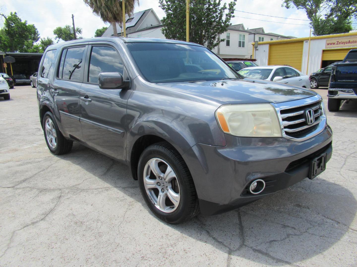 2014 Green /Black Honda Pilot EX-L 2WD AT with Navigation (5FNYF3H73EB) with an 3.5L V6 SOHC 24V engine, Automatic transmission, located at 1511 North Shepherd Dr., Houston, TX, 77008, (281) 657-1221, 29.798361, -95.412560 - 2014 HONDA PILOT EX-L W/NAVI VIN: 5FNYF3H73EB003598 5 F N Y F 3 H 7 3 E B 0 0 3 5 9 8 4 DOOR WAGON/SPORT UTILITY 3.5L V6 F SOHC 24V GASOLINE FRONT WHEEL DRIVE - Photo#23