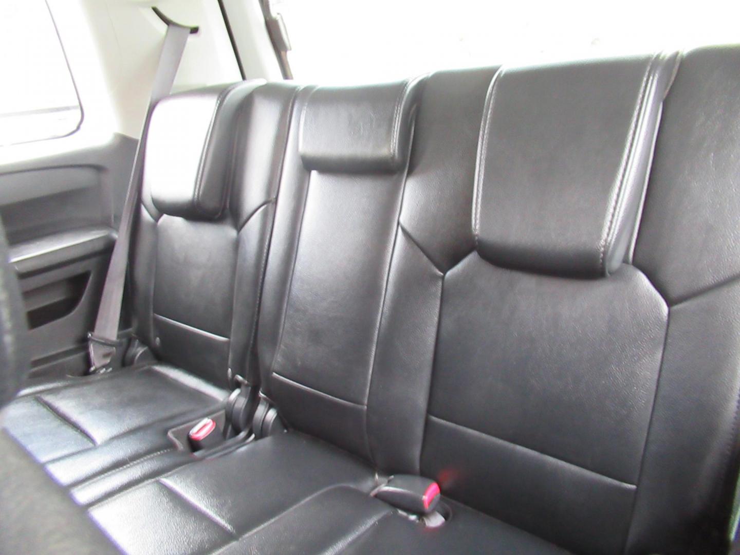 2013 Black /Black Honda Pilot Touring 4WD 5-Spd AT with DVD (5FNYF4H90DB) with an 3.5L V6 SOHC 24V engine, Automatic transmission, located at 1511 North Shepherd Dr., Houston, TX, 77008, (281) 657-1221, 29.798361, -95.412560 - 2013 HONDA PILOT TOURING VIN: 5FNYF4H90DB016749 5 F N Y F 4 H 9 0 D B 0 1 6 7 4 9 4 DOOR WAGON/SPORT UTILITY 3.5L V6 F SOHC 24V GASOLINE ALL WHEEL DRIVE - Photo#11