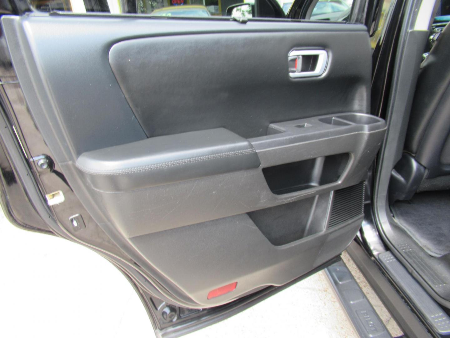 2013 Black /Black Honda Pilot Touring 4WD 5-Spd AT with DVD (5FNYF4H90DB) with an 3.5L V6 SOHC 24V engine, Automatic transmission, located at 1511 North Shepherd Dr., Houston, TX, 77008, (281) 657-1221, 29.798361, -95.412560 - 2013 HONDA PILOT TOURING VIN: 5FNYF4H90DB016749 5 F N Y F 4 H 9 0 D B 0 1 6 7 4 9 4 DOOR WAGON/SPORT UTILITY 3.5L V6 F SOHC 24V GASOLINE ALL WHEEL DRIVE - Photo#13