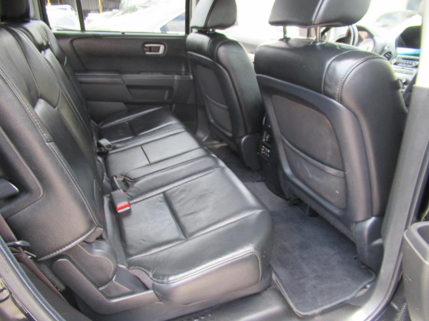 2013 Black /Black Honda Pilot Touring 4WD 5-Spd AT with DVD (5FNYF4H90DB) with an 3.5L V6 SOHC 24V engine, Automatic transmission, located at 1511 North Shepherd Dr., Houston, TX, 77008, (281) 657-1221, 29.798361, -95.412560 - 2013 HONDA PILOT TOURING VIN: 5FNYF4H90DB016749 5 F N Y F 4 H 9 0 D B 0 1 6 7 4 9 4 DOOR WAGON/SPORT UTILITY 3.5L V6 F SOHC 24V GASOLINE ALL WHEEL DRIVE - Photo#15