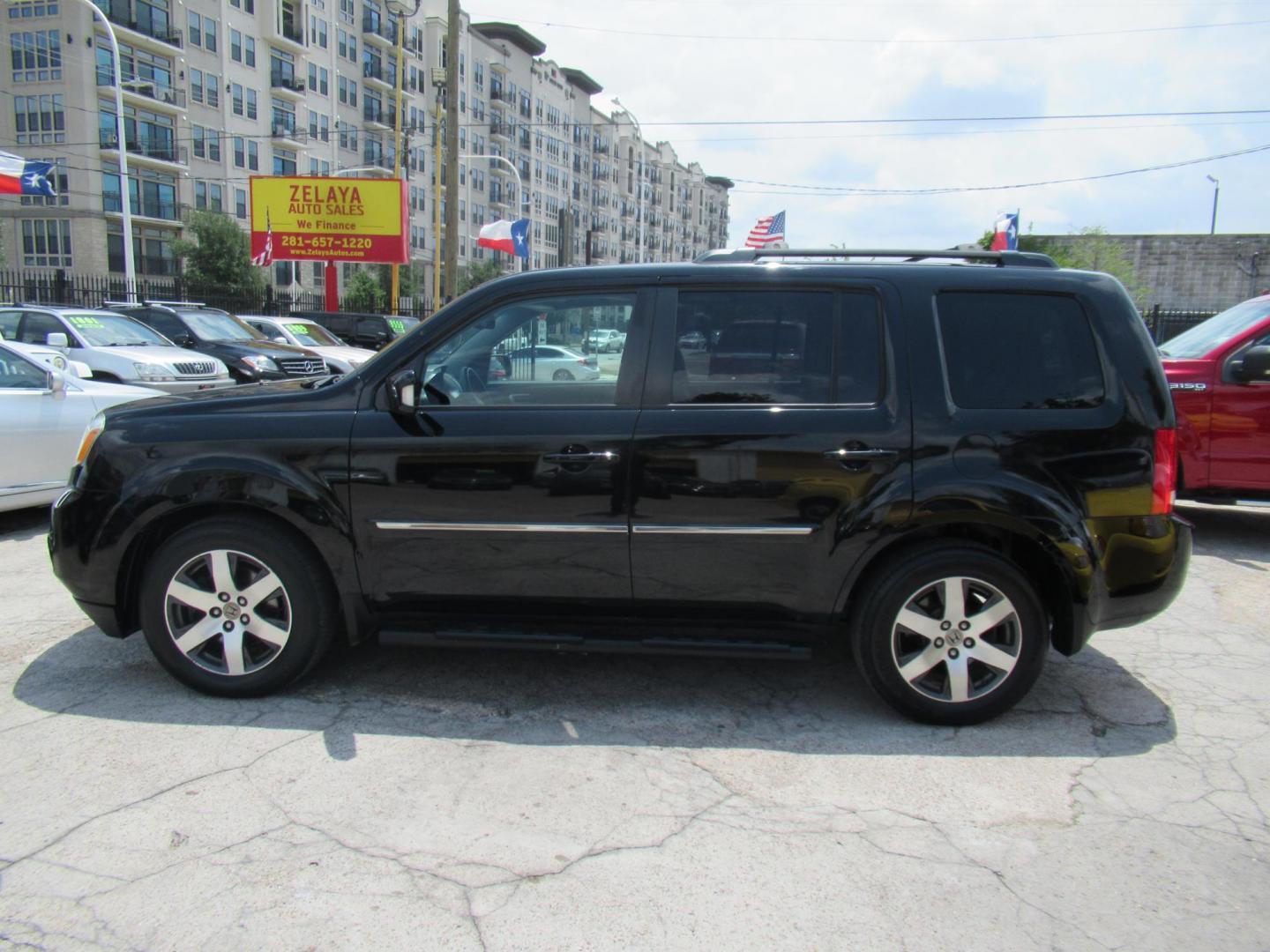 2013 Black /Black Honda Pilot Touring 4WD 5-Spd AT with DVD (5FNYF4H90DB) with an 3.5L V6 SOHC 24V engine, Automatic transmission, located at 1511 North Shepherd Dr., Houston, TX, 77008, (281) 657-1221, 29.798361, -95.412560 - 2013 HONDA PILOT TOURING VIN: 5FNYF4H90DB016749 5 F N Y F 4 H 9 0 D B 0 1 6 7 4 9 4 DOOR WAGON/SPORT UTILITY 3.5L V6 F SOHC 24V GASOLINE ALL WHEEL DRIVE - Photo#20