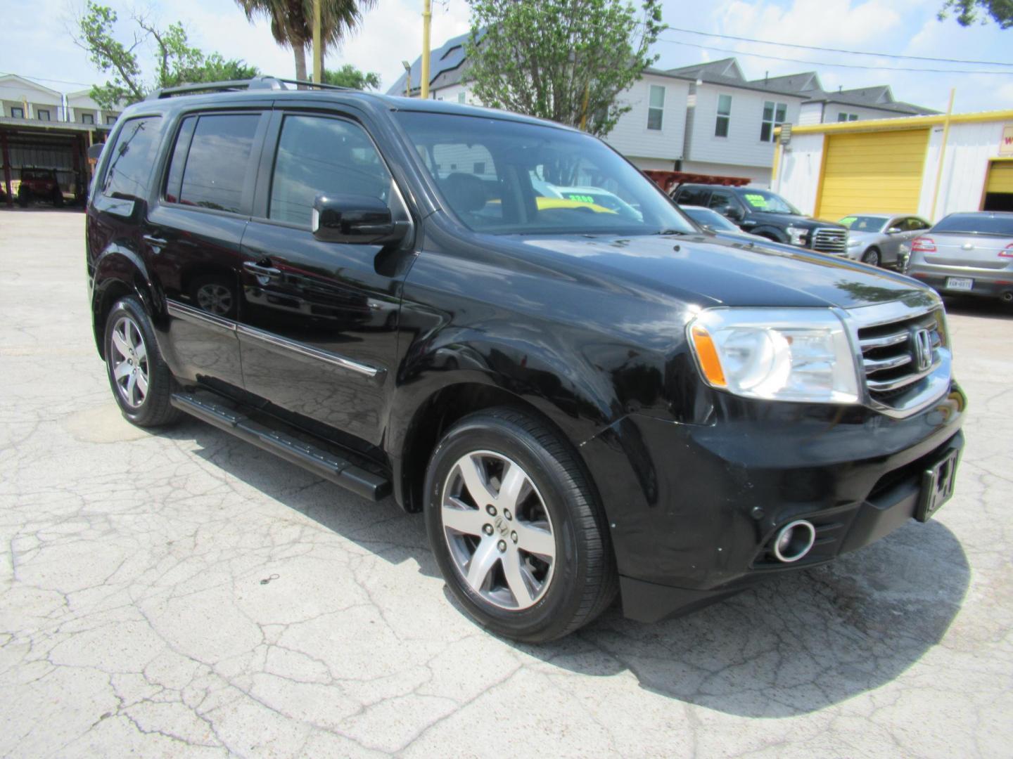 2013 Black /Black Honda Pilot Touring 4WD 5-Spd AT with DVD (5FNYF4H90DB) with an 3.5L V6 SOHC 24V engine, Automatic transmission, located at 1511 North Shepherd Dr., Houston, TX, 77008, (281) 657-1221, 29.798361, -95.412560 - 2013 HONDA PILOT TOURING VIN: 5FNYF4H90DB016749 5 F N Y F 4 H 9 0 D B 0 1 6 7 4 9 4 DOOR WAGON/SPORT UTILITY 3.5L V6 F SOHC 24V GASOLINE ALL WHEEL DRIVE - Photo#22