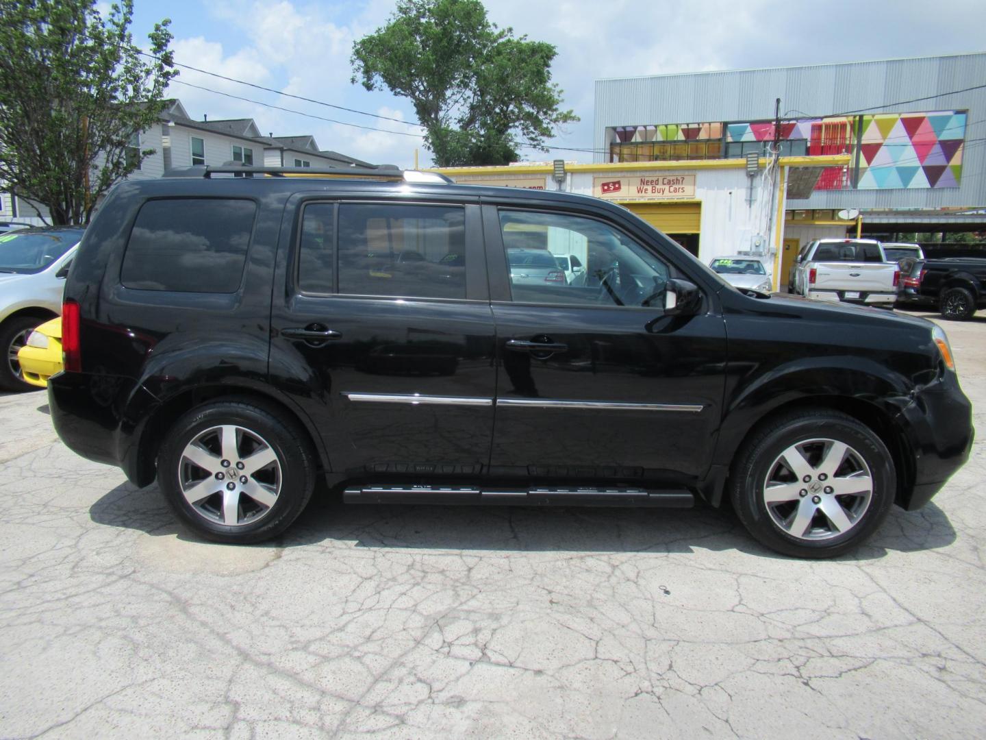 2013 Black /Black Honda Pilot Touring 4WD 5-Spd AT with DVD (5FNYF4H90DB) with an 3.5L V6 SOHC 24V engine, Automatic transmission, located at 1511 North Shepherd Dr., Houston, TX, 77008, (281) 657-1221, 29.798361, -95.412560 - 2013 HONDA PILOT TOURING VIN: 5FNYF4H90DB016749 5 F N Y F 4 H 9 0 D B 0 1 6 7 4 9 4 DOOR WAGON/SPORT UTILITY 3.5L V6 F SOHC 24V GASOLINE ALL WHEEL DRIVE - Photo#23