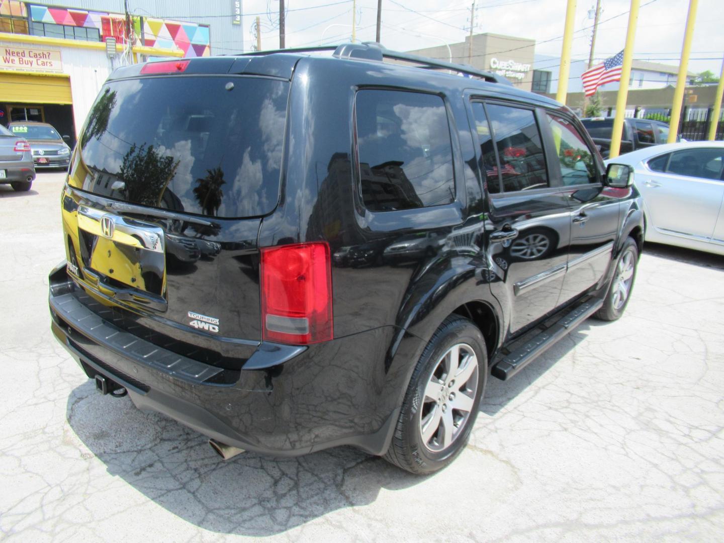2013 Black /Black Honda Pilot Touring 4WD 5-Spd AT with DVD (5FNYF4H90DB) with an 3.5L V6 SOHC 24V engine, Automatic transmission, located at 1511 North Shepherd Dr., Houston, TX, 77008, (281) 657-1221, 29.798361, -95.412560 - 2013 HONDA PILOT TOURING VIN: 5FNYF4H90DB016749 5 F N Y F 4 H 9 0 D B 0 1 6 7 4 9 4 DOOR WAGON/SPORT UTILITY 3.5L V6 F SOHC 24V GASOLINE ALL WHEEL DRIVE - Photo#24