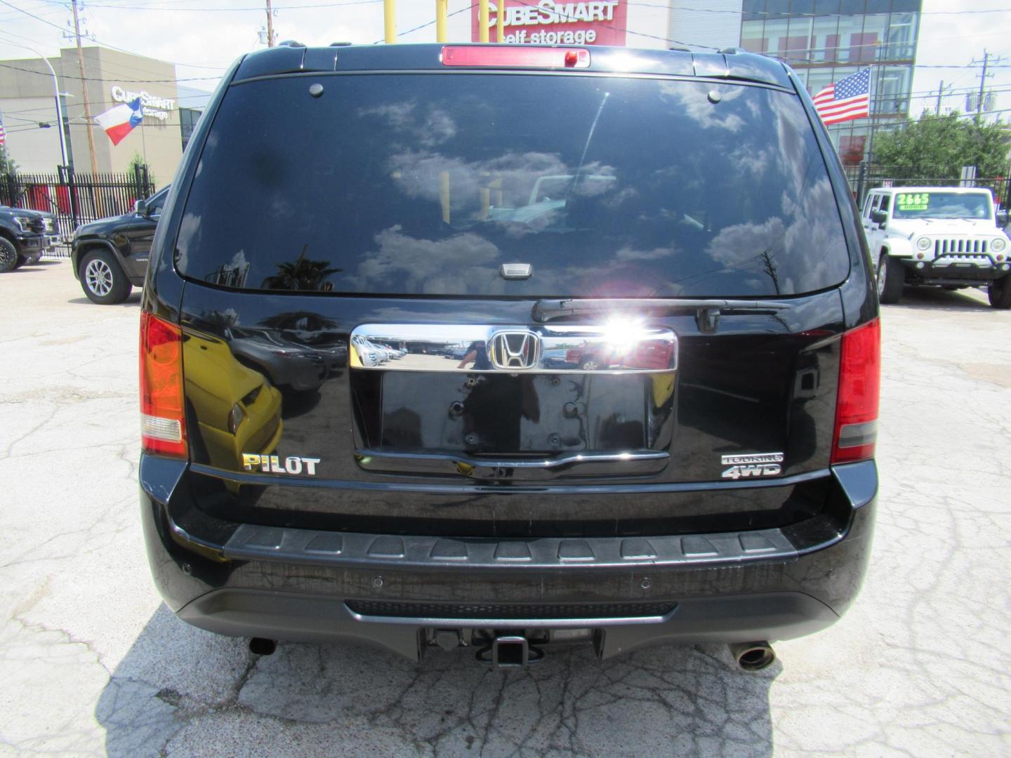 2013 Black /Black Honda Pilot Touring 4WD 5-Spd AT with DVD (5FNYF4H90DB) with an 3.5L V6 SOHC 24V engine, Automatic transmission, located at 1511 North Shepherd Dr., Houston, TX, 77008, (281) 657-1221, 29.798361, -95.412560 - 2013 HONDA PILOT TOURING VIN: 5FNYF4H90DB016749 5 F N Y F 4 H 9 0 D B 0 1 6 7 4 9 4 DOOR WAGON/SPORT UTILITY 3.5L V6 F SOHC 24V GASOLINE ALL WHEEL DRIVE - Photo#25