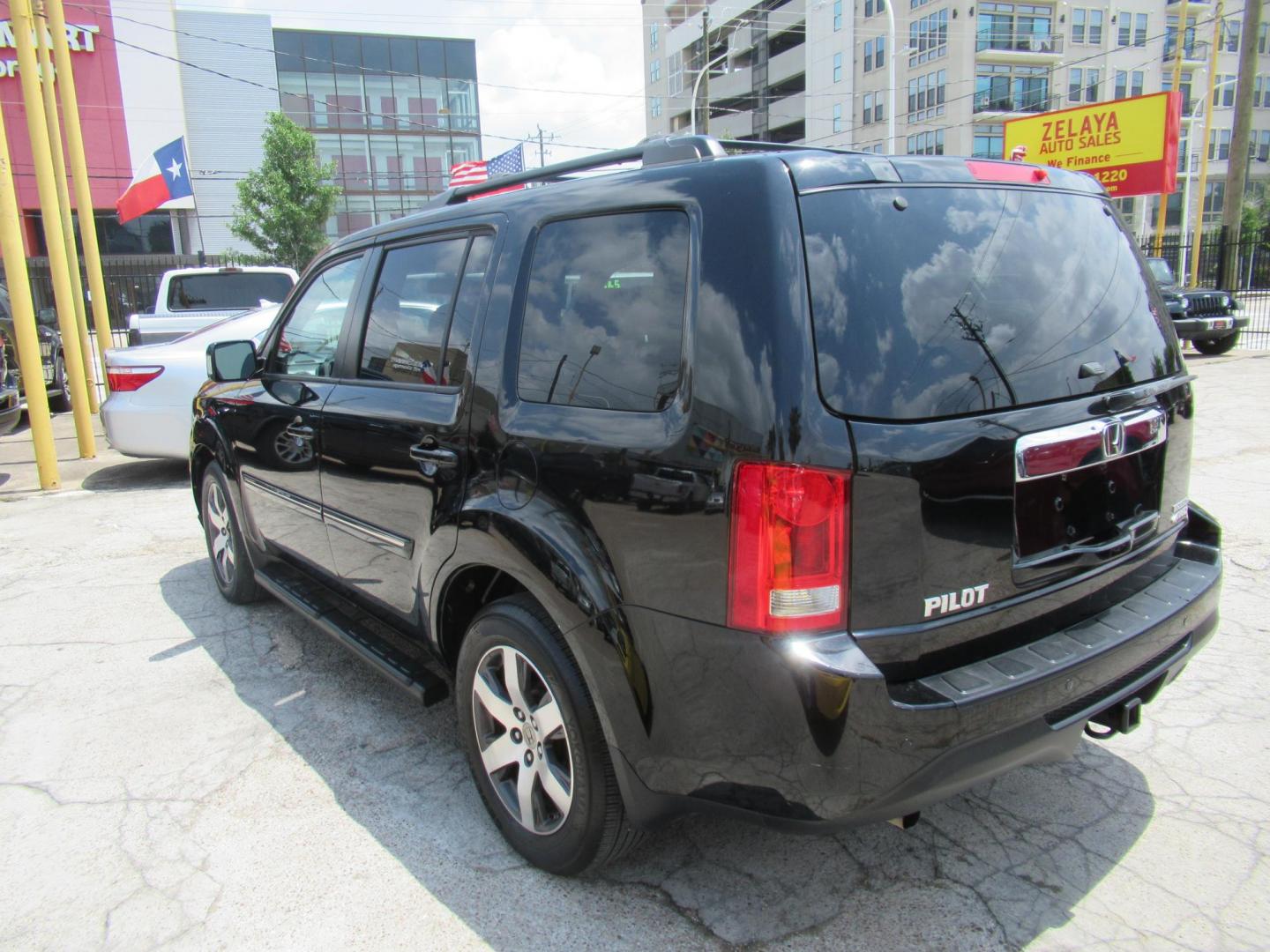 2013 Black /Black Honda Pilot Touring 4WD 5-Spd AT with DVD (5FNYF4H90DB) with an 3.5L V6 SOHC 24V engine, Automatic transmission, located at 1511 North Shepherd Dr., Houston, TX, 77008, (281) 657-1221, 29.798361, -95.412560 - 2013 HONDA PILOT TOURING VIN: 5FNYF4H90DB016749 5 F N Y F 4 H 9 0 D B 0 1 6 7 4 9 4 DOOR WAGON/SPORT UTILITY 3.5L V6 F SOHC 24V GASOLINE ALL WHEEL DRIVE - Photo#26