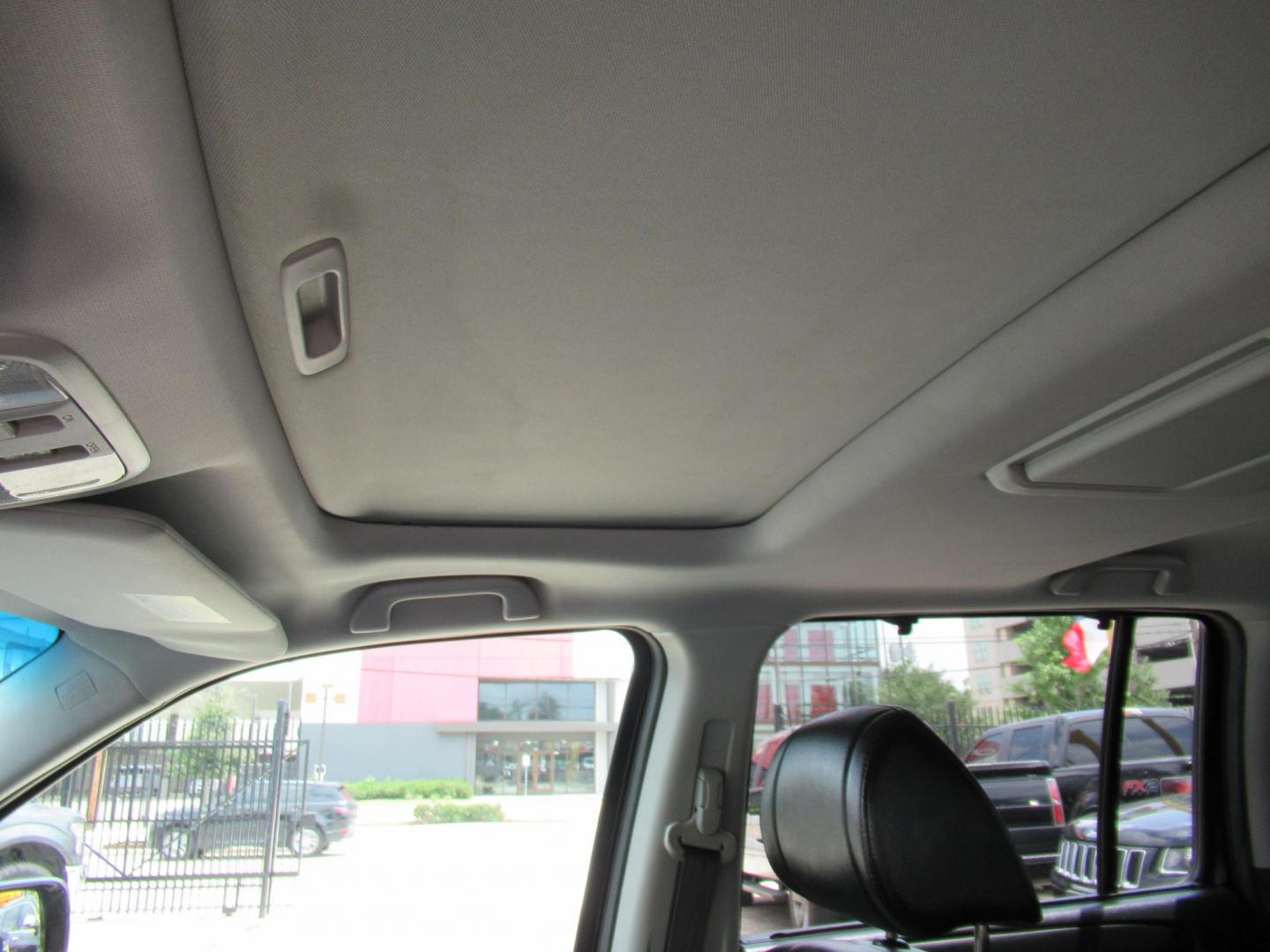2013 Black /Black Honda Pilot Touring 4WD 5-Spd AT with DVD (5FNYF4H90DB) with an 3.5L V6 SOHC 24V engine, Automatic transmission, located at 1511 North Shepherd Dr., Houston, TX, 77008, (281) 657-1221, 29.798361, -95.412560 - 2013 HONDA PILOT TOURING VIN: 5FNYF4H90DB016749 5 F N Y F 4 H 9 0 D B 0 1 6 7 4 9 4 DOOR WAGON/SPORT UTILITY 3.5L V6 F SOHC 24V GASOLINE ALL WHEEL DRIVE - Photo#4