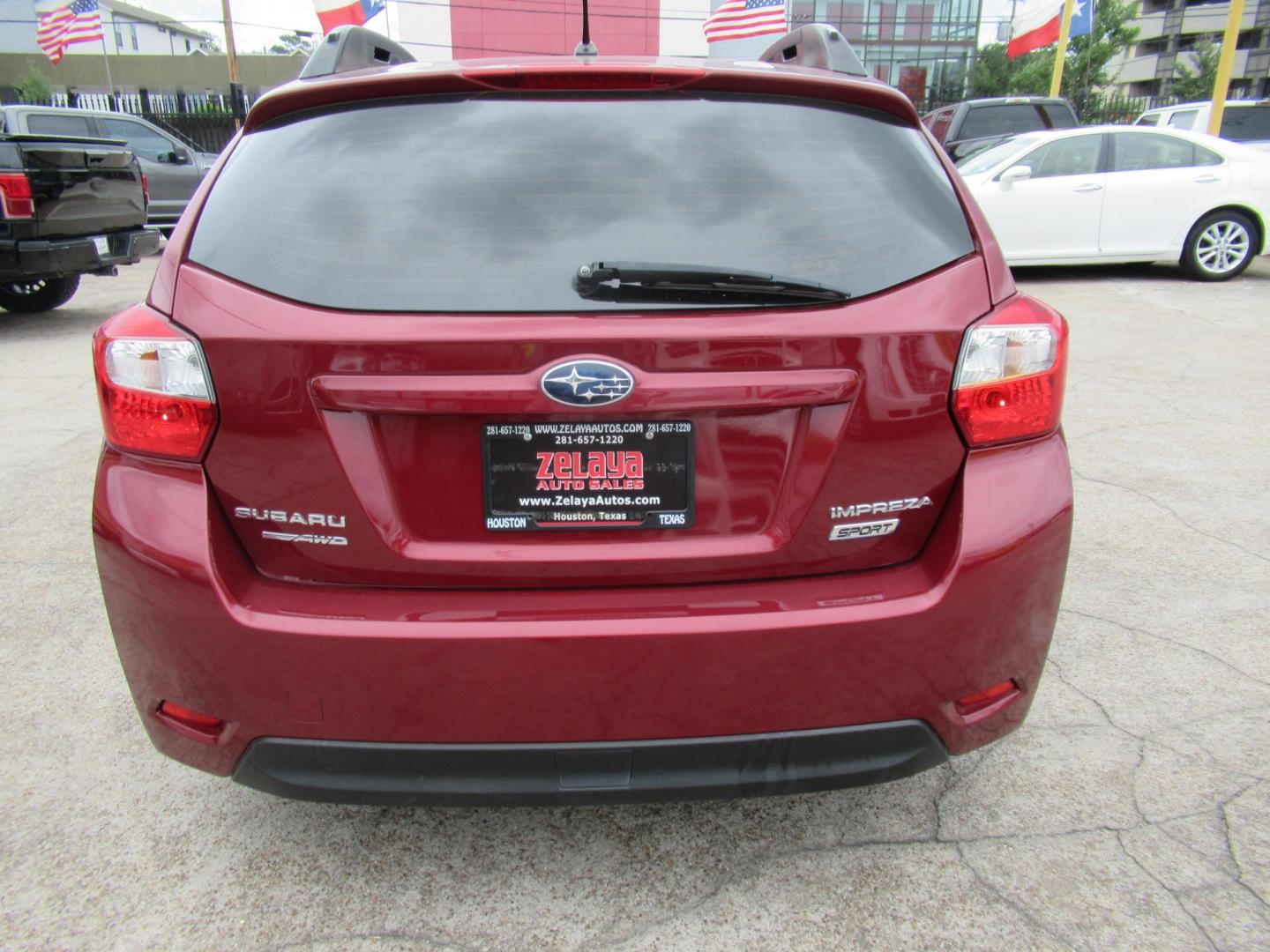 2014 Red /Black Subaru Impreza 2.0i Sport Premium (JF1GPAL60E8) with an 2.0L H4 DOHC 16V engine, Automatic transmission, located at 1511 North Shepherd Dr., Houston, TX, 77008, (281) 657-1221, 29.798361, -95.412560 - 2014 SUBARU IMPREZA 2.0I SPORT PREMIUM VIN: JF1GPAL60E8257433 J F 1 G P A L 6 0 E 8 2 5 7 4 3 3 WAGON 4 DR 2.0L H4 F SOHC 16V GASOLINE ALL WHEEL DRIVE - Photo#13