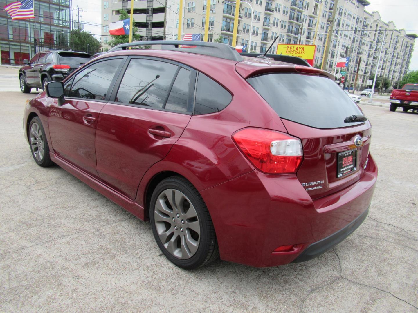 2014 Red /Black Subaru Impreza 2.0i Sport Premium (JF1GPAL60E8) with an 2.0L H4 DOHC 16V engine, Automatic transmission, located at 1511 North Shepherd Dr., Houston, TX, 77008, (281) 657-1221, 29.798361, -95.412560 - 2014 SUBARU IMPREZA 2.0I SPORT PREMIUM VIN: JF1GPAL60E8257433 J F 1 G P A L 6 0 E 8 2 5 7 4 3 3 WAGON 4 DR 2.0L H4 F SOHC 16V GASOLINE ALL WHEEL DRIVE - Photo#14
