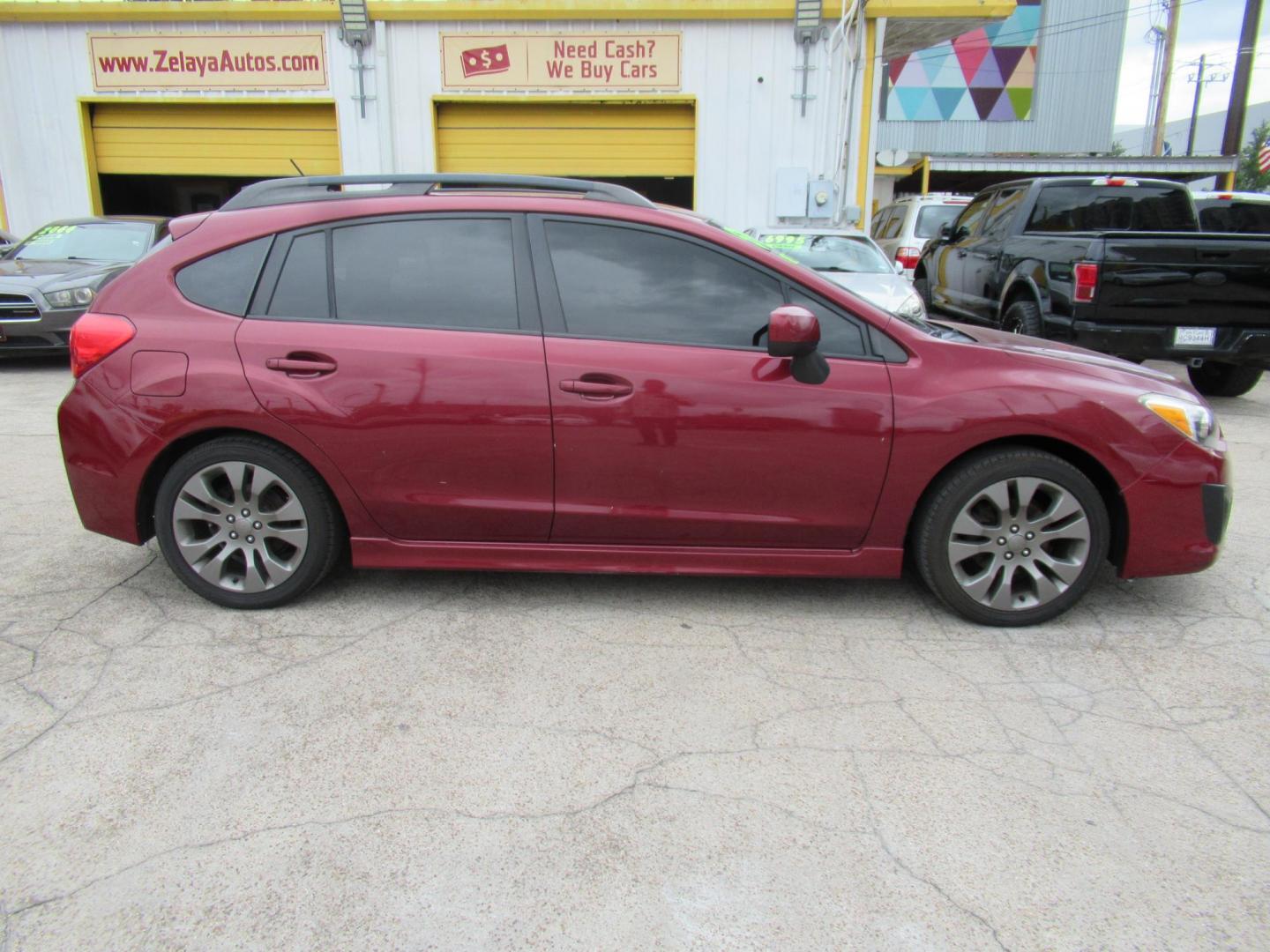 2014 Red /Black Subaru Impreza 2.0i Sport Premium (JF1GPAL60E8) with an 2.0L H4 DOHC 16V engine, Automatic transmission, located at 1511 North Shepherd Dr., Houston, TX, 77008, (281) 657-1221, 29.798361, -95.412560 - 2014 SUBARU IMPREZA 2.0I SPORT PREMIUM VIN: JF1GPAL60E8257433 J F 1 G P A L 6 0 E 8 2 5 7 4 3 3 WAGON 4 DR 2.0L H4 F SOHC 16V GASOLINE ALL WHEEL DRIVE - Photo#18