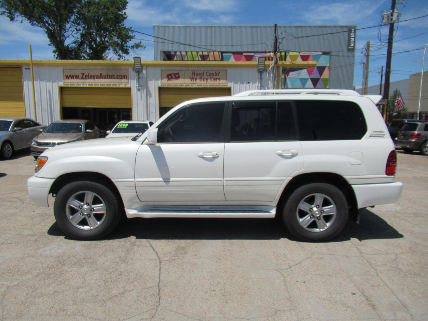 2006 White /Tan Lexus LX 470 Sport Utility (JTJHT00W264) with an 4.7L V8 DOHC 32V engine, Automatic Overdrive transmission, located at 1511 North Shepherd Dr., Houston, TX, 77008, (281) 657-1221, 29.798361, -95.412560 - 2006 LEXUS LX 470 VIN: JTJHT00W264012132 J T J H T 0 0 W 2 6 4 0 1 2 1 3 2 4 DOOR WAGON/SPORT UTILITY 4.7L V8 F 32V GASOLINE ALL WHEEL DRIVE - Photo#55