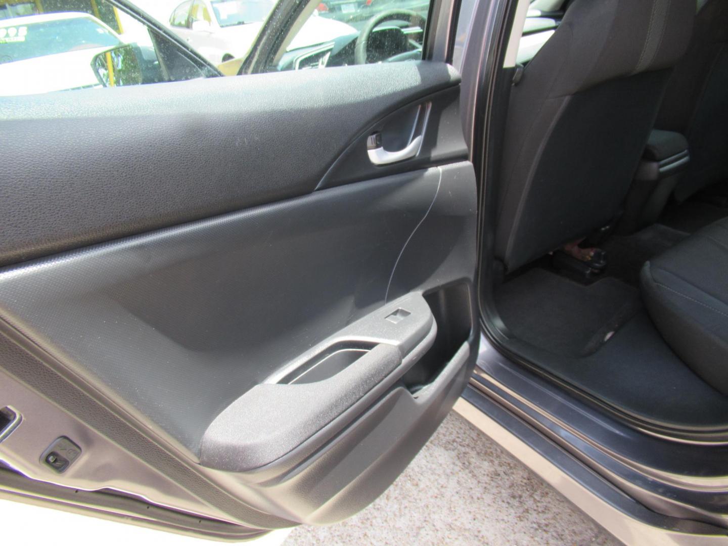 2017 Gray /Black Honda Civic LX Sedan CVT (19XFC2F51HE) with an 2.0L L4 DOHC 16V engine, CVT transmission, located at 1511 North Shepherd Dr., Houston, TX, 77008, (281) 657-1221, 29.798361, -95.412560 - 2017 HONDA CIVIC LX VIN: 19XFC2F51HE036413 1 9 X F C 2 F 5 1 H E 0 3 6 4 1 3 SEDAN 4 DR 2.0L I4 F DOHC 16V GASOLINE FRONT WHEEL DRIVE - Photo#7