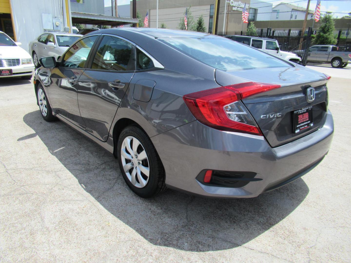 2017 Gray /Black Honda Civic LX Sedan CVT (19XFC2F51HE) with an 2.0L L4 DOHC 16V engine, CVT transmission, located at 1511 North Shepherd Dr., Houston, TX, 77008, (281) 657-1221, 29.798361, -95.412560 - 2017 HONDA CIVIC LX VIN: 19XFC2F51HE036413 1 9 X F C 2 F 5 1 H E 0 3 6 4 1 3 SEDAN 4 DR 2.0L I4 F DOHC 16V GASOLINE FRONT WHEEL DRIVE - Photo#13