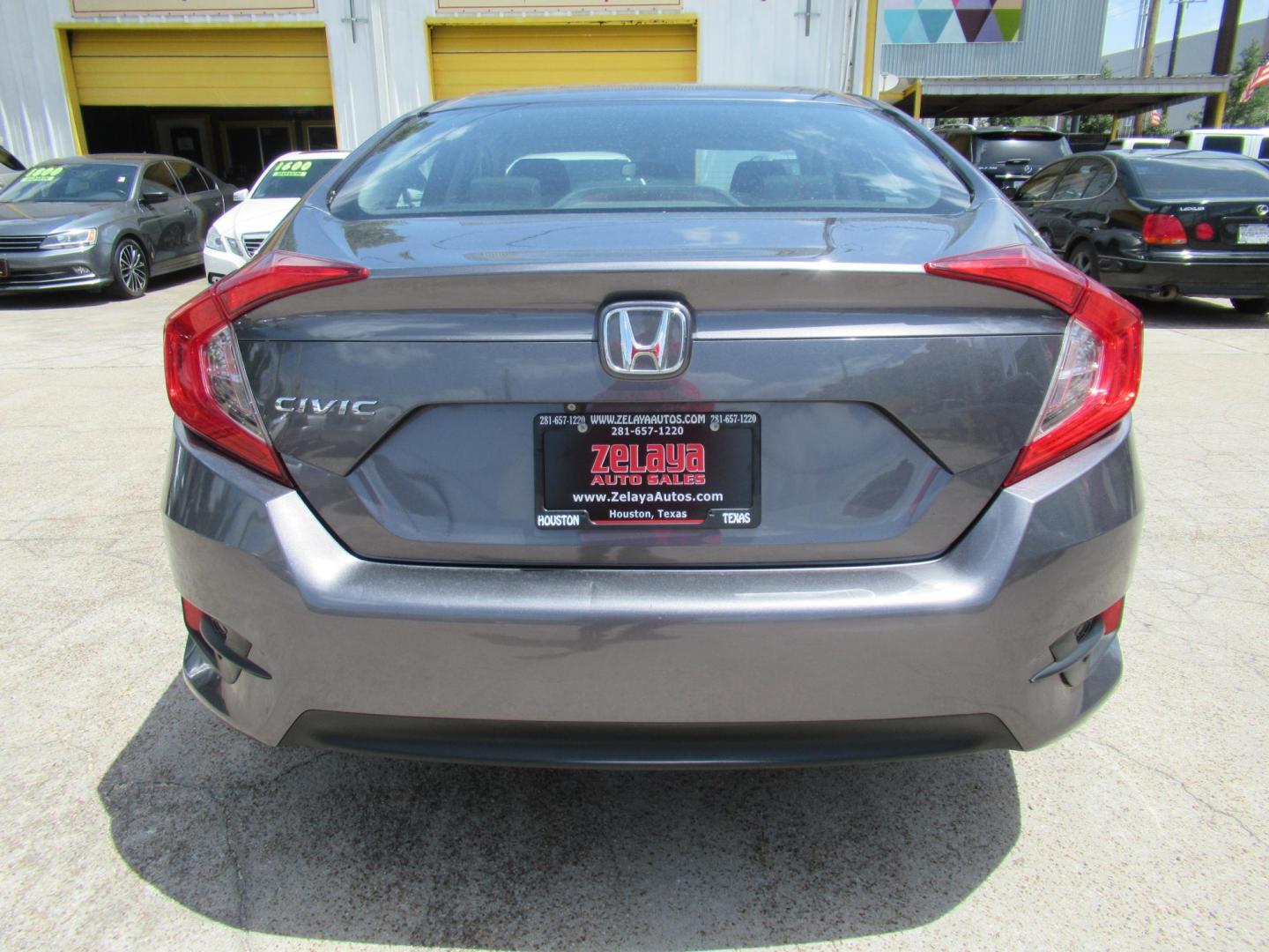 2017 Gray /Black Honda Civic LX Sedan CVT (19XFC2F51HE) with an 2.0L L4 DOHC 16V engine, CVT transmission, located at 1511 North Shepherd Dr., Houston, TX, 77008, (281) 657-1221, 29.798361, -95.412560 - 2017 HONDA CIVIC LX VIN: 19XFC2F51HE036413 1 9 X F C 2 F 5 1 H E 0 3 6 4 1 3 SEDAN 4 DR 2.0L I4 F DOHC 16V GASOLINE FRONT WHEEL DRIVE - Photo#14