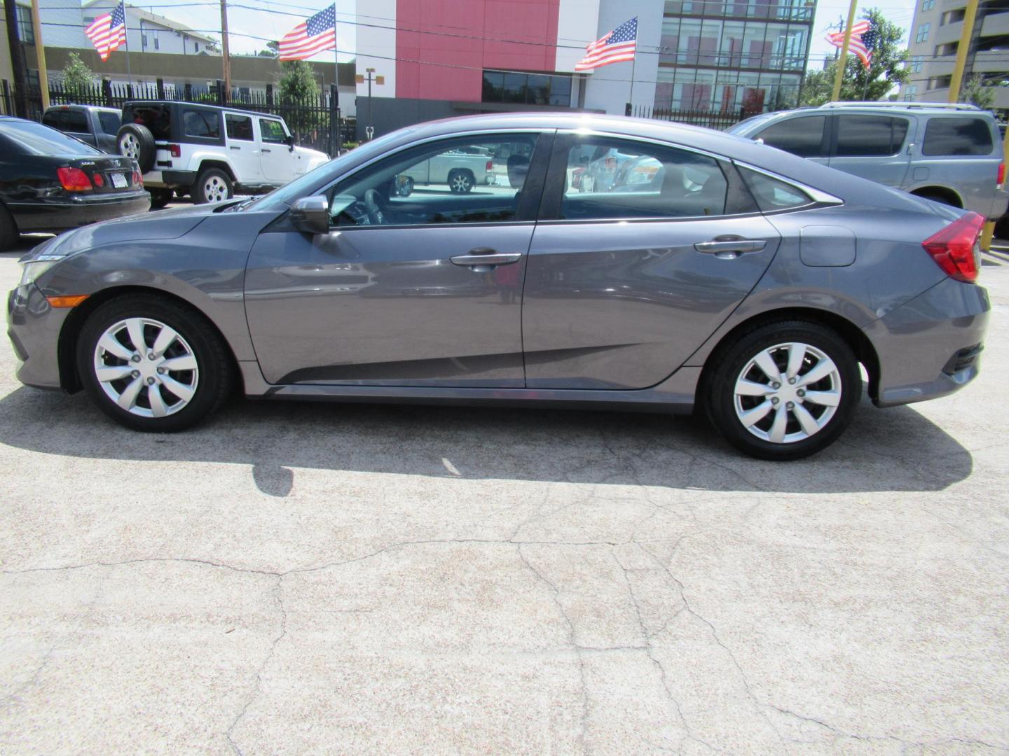 2017 Gray /Black Honda Civic LX Sedan CVT (19XFC2F51HE) with an 2.0L L4 DOHC 16V engine, CVT transmission, located at 1511 North Shepherd Dr., Houston, TX, 77008, (281) 657-1221, 29.798361, -95.412560 - 2017 HONDA CIVIC LX VIN: 19XFC2F51HE036413 1 9 X F C 2 F 5 1 H E 0 3 6 4 1 3 SEDAN 4 DR 2.0L I4 F DOHC 16V GASOLINE FRONT WHEEL DRIVE - Photo#20