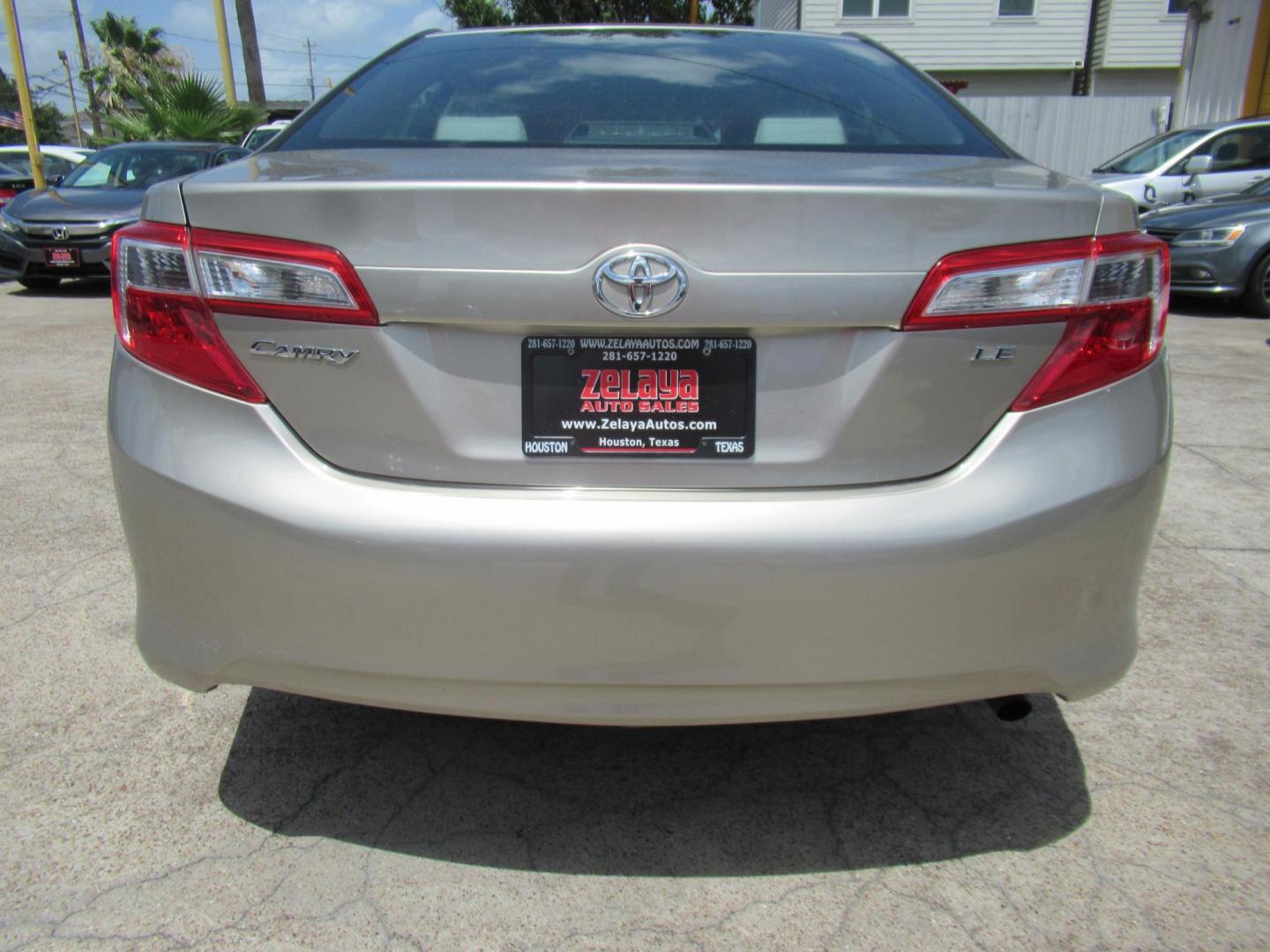 2013 Gold /Tan Toyota Camry SE (4T4BF1FK6DR) with an 2.5L L4 DOHC 16V engine, 6-Speed Automatic transmission, located at 1511 North Shepherd Dr., Houston, TX, 77008, (281) 657-1221, 29.798361, -95.412560 - 2013 TOYOTA CAMRY LE VIN: 4T4BF1FK6DR275183 4 T 4 B F 1 F K 6 D R 2 7 5 1 8 3 SEDAN 4 DR 2.5L I4 F DOHC 16V GASOLINE FRONT WHEEL DRIVE - Photo#21
