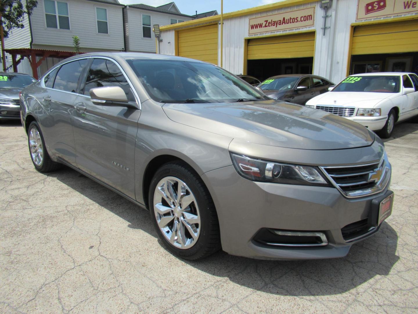2018 Gray /Black Chevrolet Impala LT (2G1105S31J9) with an 3.6L V6 DOHC 24V engine, 6A transmission, located at 1511 North Shepherd Dr., Houston, TX, 77008, (281) 657-1221, 29.798361, -95.412560 - 2018 CHEVROLET IMPALA LT VIN: 2G1105S31J9119670 2 G 1 1 0 5 S 3 1 J 9 1 1 9 6 7 0 SEDAN 4 DR 3.6L V6 F DOHC 24V GASOLINE FRONT WHEEL DRIVE - Photo#24