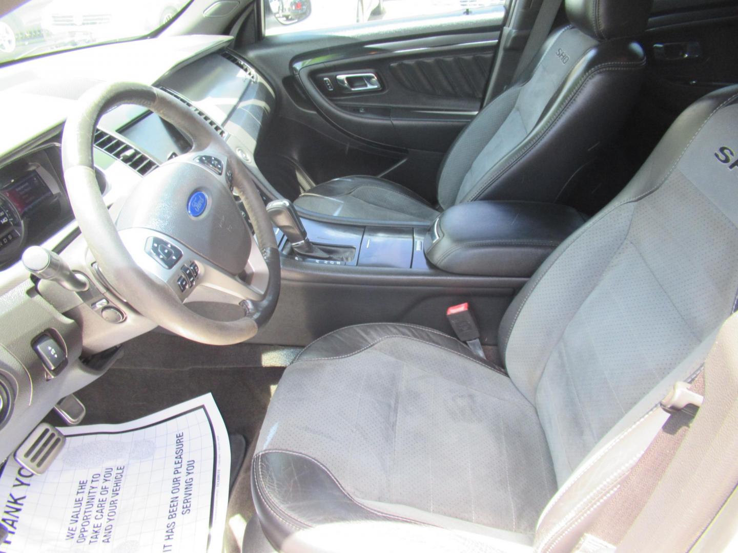 2013 White /Black Ford Taurus SHO AWD (1FAHP2KT8DG) with an 3.5L V6 DOHC 24V engine, 6-Speed Automatic transmission, located at 1511 North Shepherd Dr., Houston, TX, 77008, (281) 657-1221, 29.798361, -95.412560 - 2013 FORD TAURUS SHO VIN: 1FAHP2KT8DG169221 1 F A H P 2 K T 8 D G 1 6 9 2 2 1 SEDAN 4 DR 3.5L V6 F DOHC 16V GASOLINE ALL WHEEL DRIVE - Photo#1