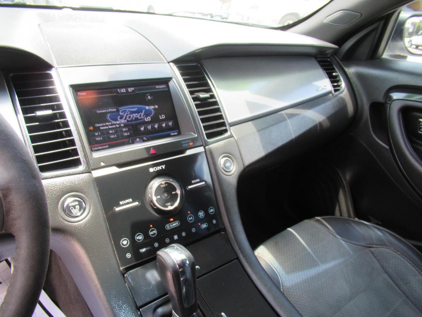 2013 White /Black Ford Taurus SHO AWD (1FAHP2KT8DG) with an 3.5L V6 DOHC 24V engine, 6-Speed Automatic transmission, located at 1511 North Shepherd Dr., Houston, TX, 77008, (281) 657-1221, 29.798361, -95.412560 - 2013 FORD TAURUS SHO VIN: 1FAHP2KT8DG169221 1 F A H P 2 K T 8 D G 1 6 9 2 2 1 SEDAN 4 DR 3.5L V6 F DOHC 16V GASOLINE ALL WHEEL DRIVE - Photo#4