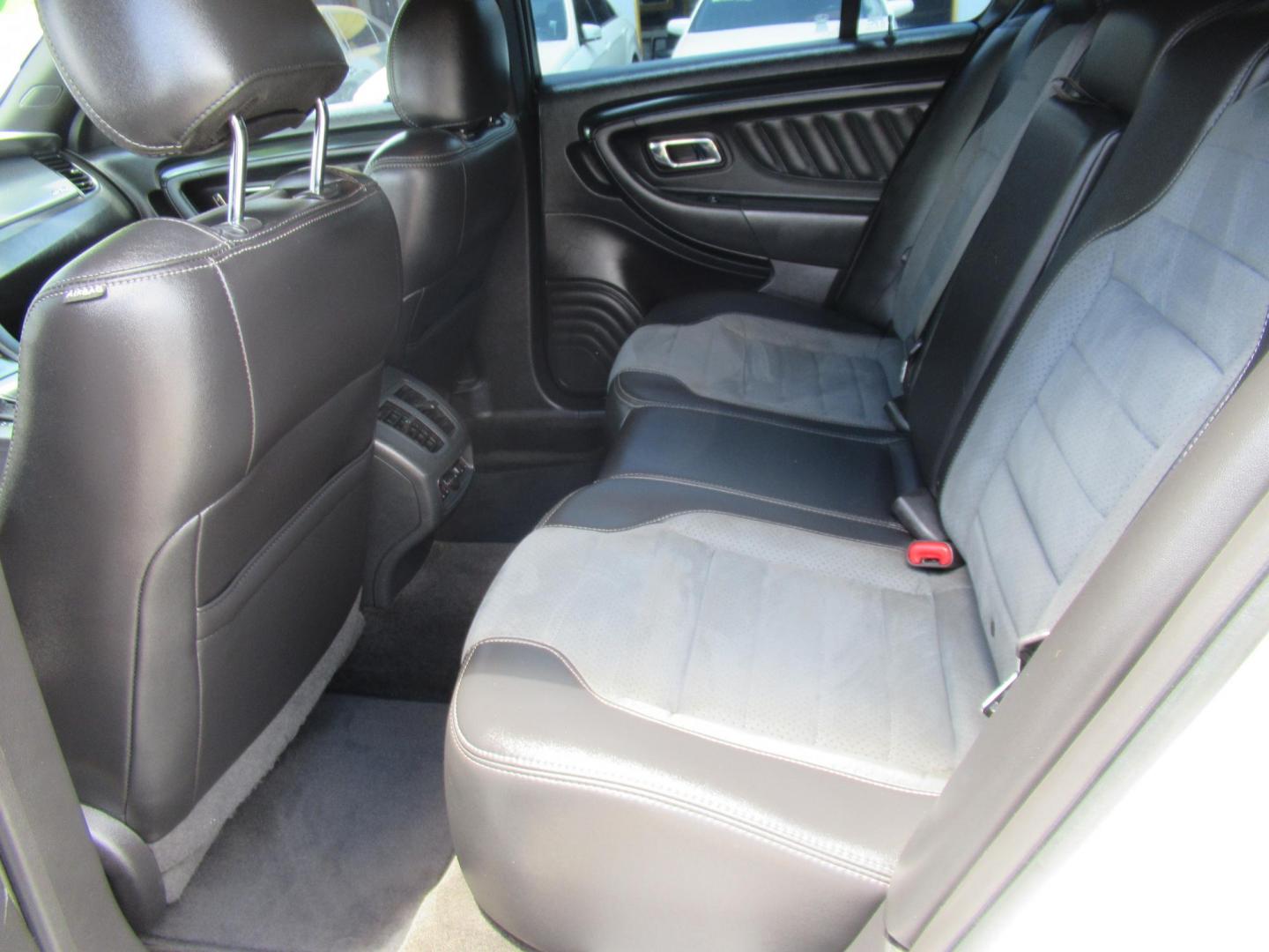 2013 White /Black Ford Taurus SHO AWD (1FAHP2KT8DG) with an 3.5L V6 DOHC 24V engine, 6-Speed Automatic transmission, located at 1511 North Shepherd Dr., Houston, TX, 77008, (281) 657-1221, 29.798361, -95.412560 - 2013 FORD TAURUS SHO VIN: 1FAHP2KT8DG169221 1 F A H P 2 K T 8 D G 1 6 9 2 2 1 SEDAN 4 DR 3.5L V6 F DOHC 16V GASOLINE ALL WHEEL DRIVE - Photo#7