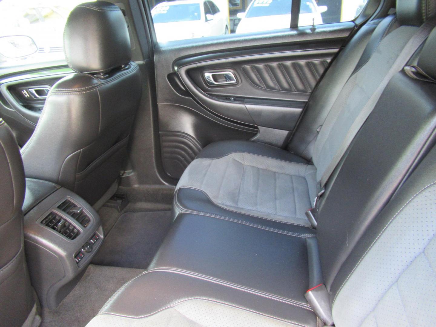 2013 White /Black Ford Taurus SHO AWD (1FAHP2KT8DG) with an 3.5L V6 DOHC 24V engine, 6-Speed Automatic transmission, located at 1511 North Shepherd Dr., Houston, TX, 77008, (281) 657-1221, 29.798361, -95.412560 - 2013 FORD TAURUS SHO VIN: 1FAHP2KT8DG169221 1 F A H P 2 K T 8 D G 1 6 9 2 2 1 SEDAN 4 DR 3.5L V6 F DOHC 16V GASOLINE ALL WHEEL DRIVE - Photo#8