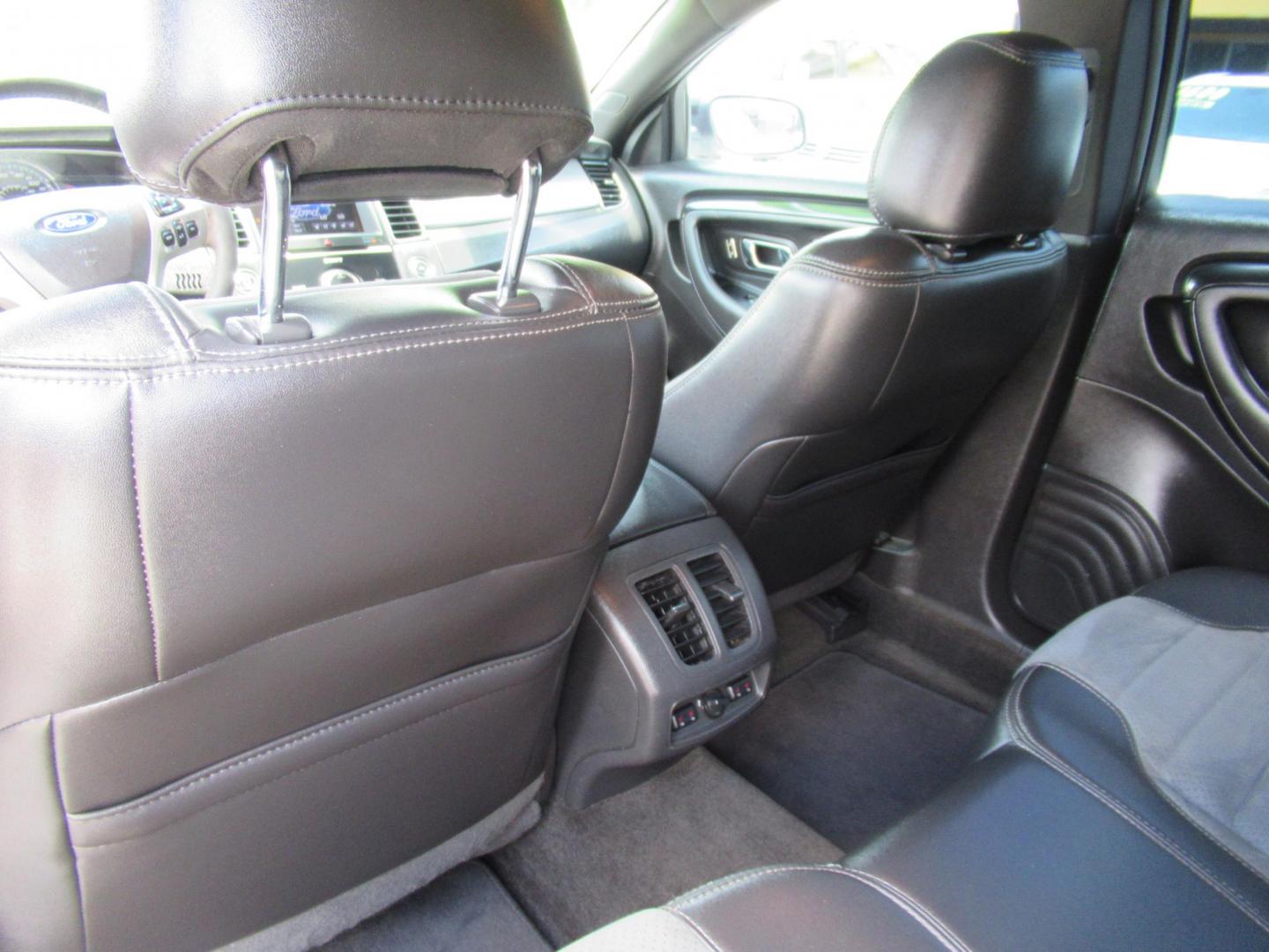 2013 White /Black Ford Taurus SHO AWD (1FAHP2KT8DG) with an 3.5L V6 DOHC 24V engine, 6-Speed Automatic transmission, located at 1511 North Shepherd Dr., Houston, TX, 77008, (281) 657-1221, 29.798361, -95.412560 - 2013 FORD TAURUS SHO VIN: 1FAHP2KT8DG169221 1 F A H P 2 K T 8 D G 1 6 9 2 2 1 SEDAN 4 DR 3.5L V6 F DOHC 16V GASOLINE ALL WHEEL DRIVE - Photo#9
